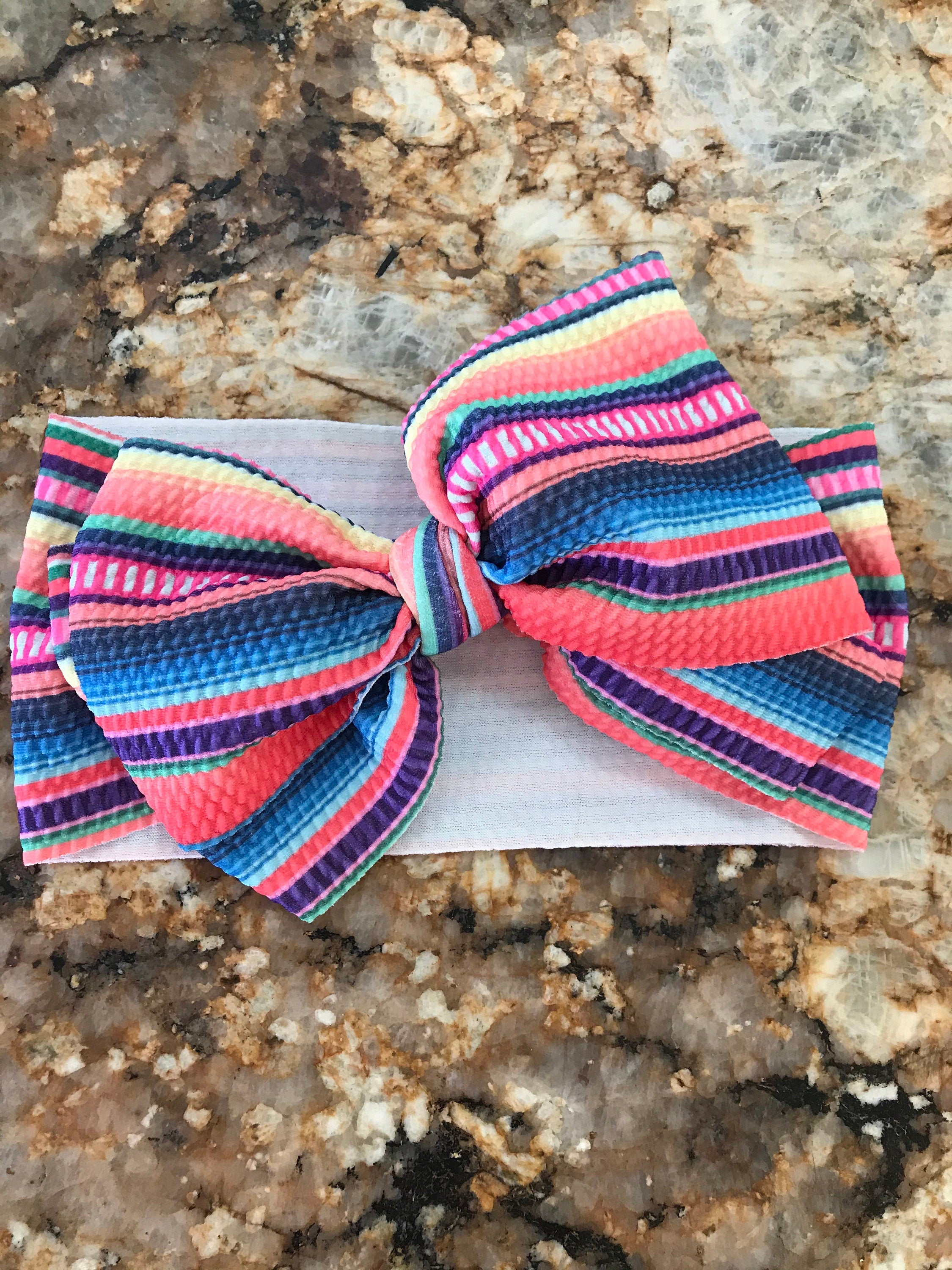 Pink Stripe These Big Bow Headbands for babies and toddlers are the perfect finishing touch to your little one&#39;s adorable outfit (also sold by Razels 😉). Soft, stretchy, and adjustable, they provide both comfort and style! And now, they’re available in even more colors!
✔ Hand-tied, not sewn, so you can adjust for the perfect fit