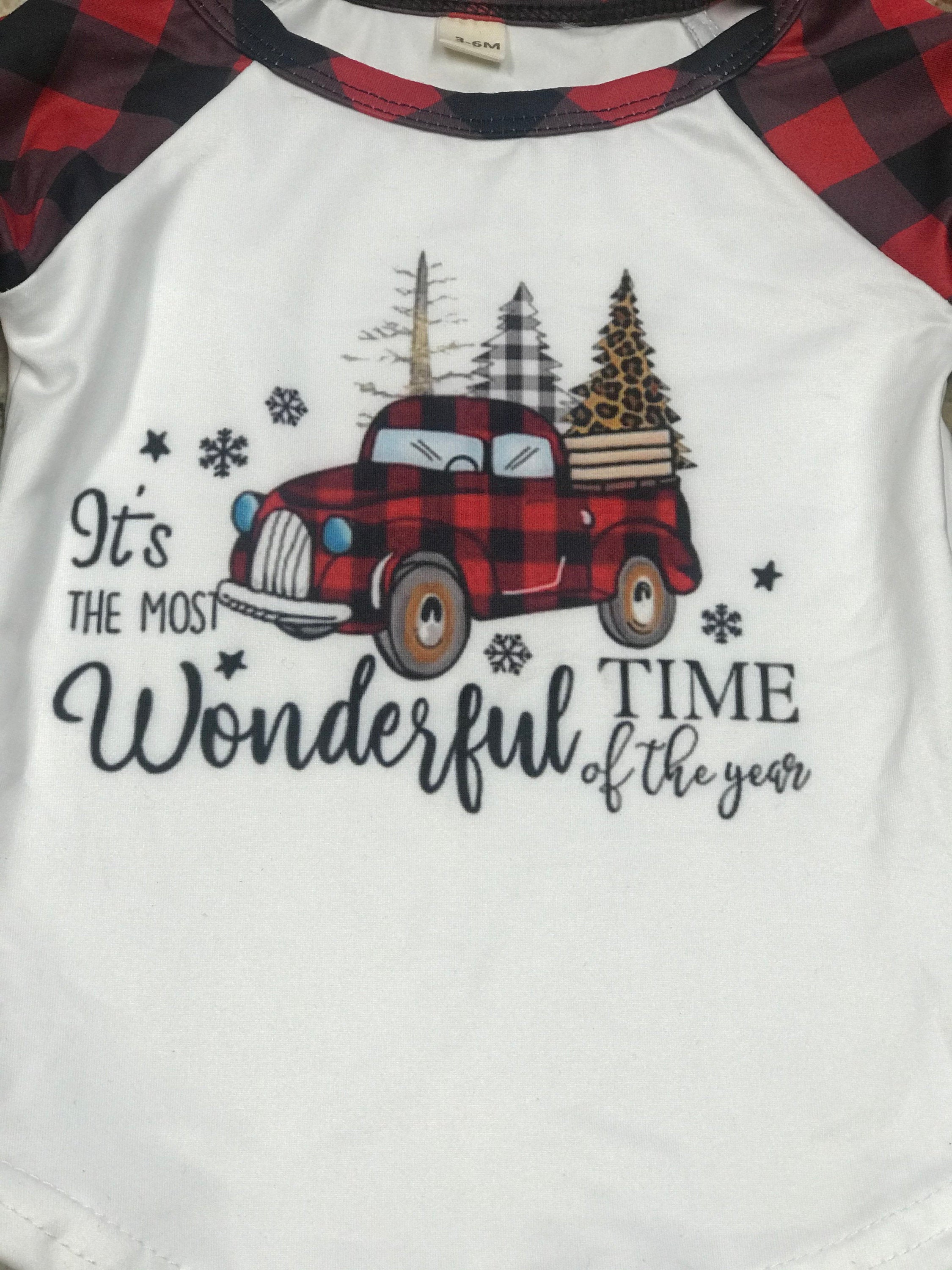 girls christmas outfits featuring red and black checkered buffalo plaid trouser pants and your choice of Merry Christmas or It&#39;s the Most Wonderful Time of the Year Long Sleeve Shirts