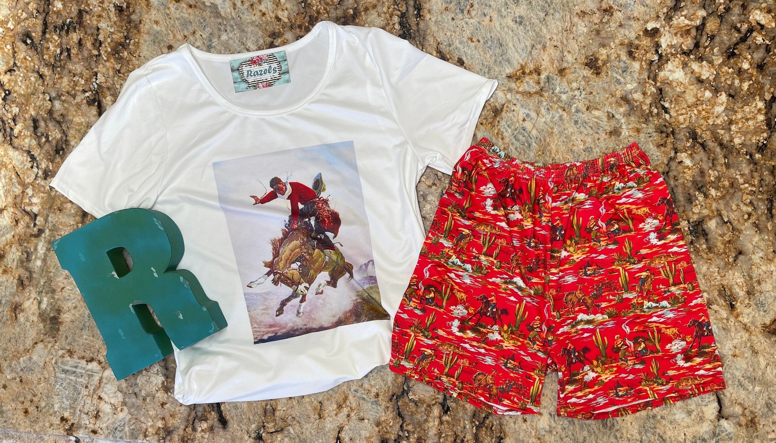 How fun is this Cowboy Shorts & Cowboy T-Shirt set?! 🌵 This Western Lounge Set is everything—perfect for lounging, running errands, or styling up for a day out. The vintage cowboy print gives it that classic Western feel, and the shorts? Absolute perfection! 😍

✨ Why You’ll Love It:
✔ Semi-fitted Cowboy T-Shirt for a flattering look (Medium: 19” underarm to underarm)
✔ Mom and Daughter Matching available—grab the kids&#39; version, too!