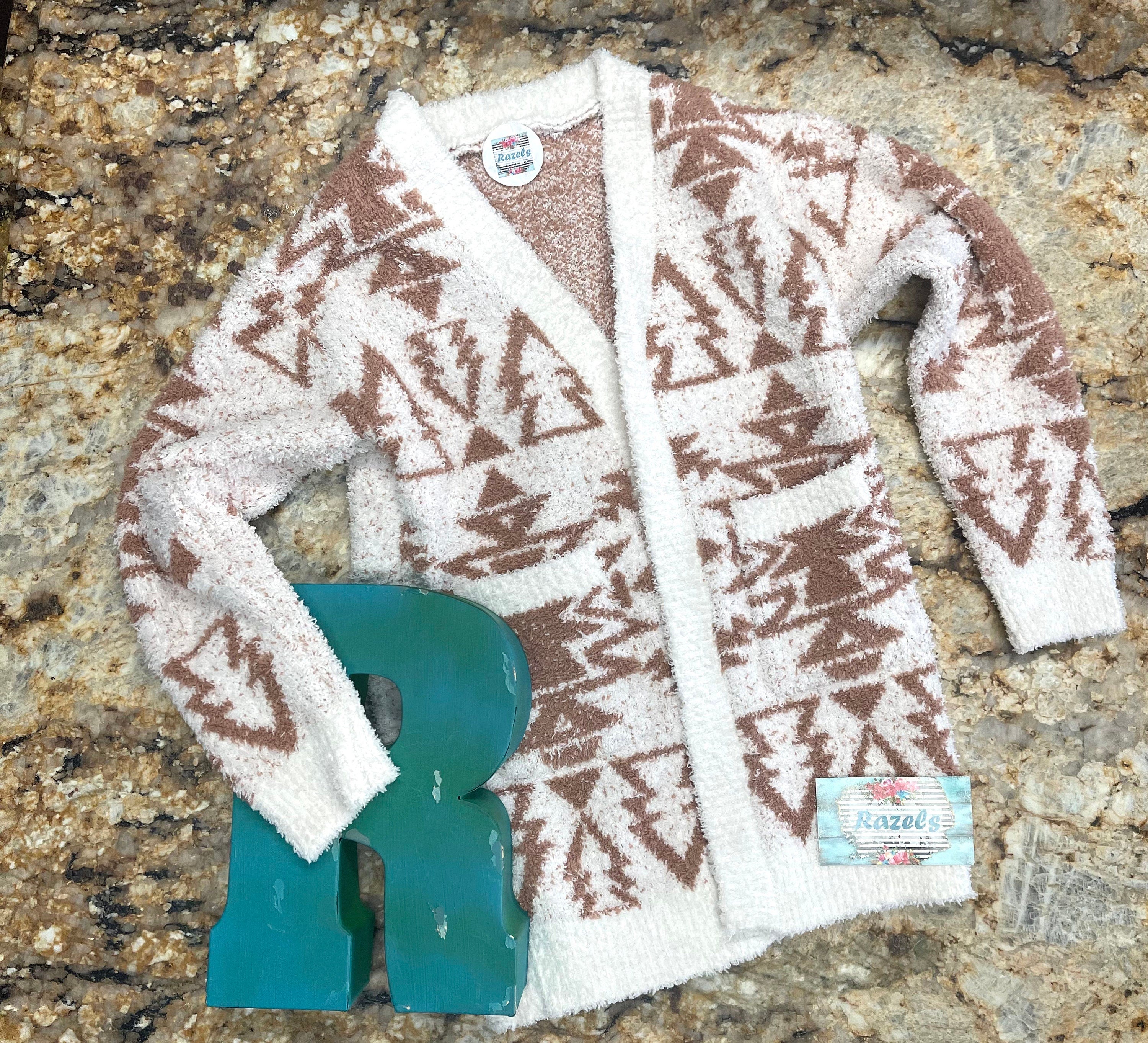 Girls Cozy Western Cardigan Sweater, A beautiful Cream sweater with tan southwestern aztec designs. A super soft sweater with big pockets and perfect for Fall.