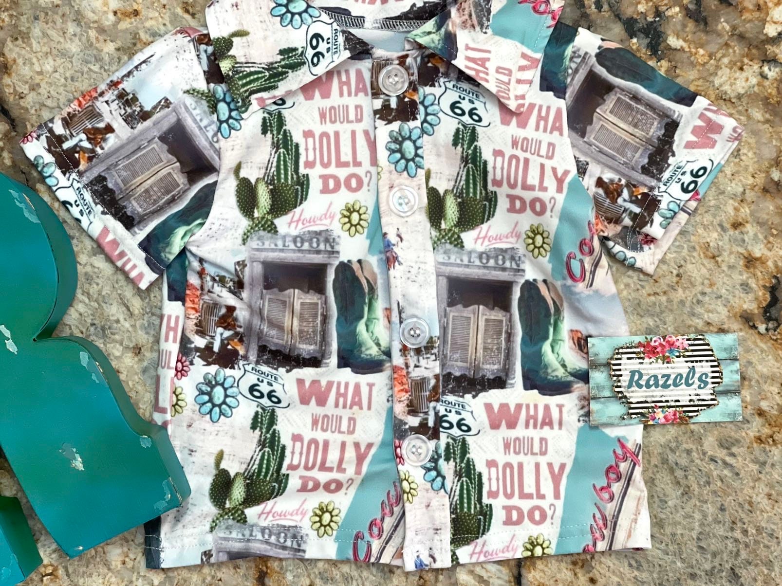 Get ready to dazzle with our adorable What Would Dolly Do? Cowgirl Shirt & Fringe Bodysuit. 
 The button-up shirt features a bold Western-inspired design, while the fringe bodysuit adds flair in vibrant pink. Shop Razels for Girls Western Wear