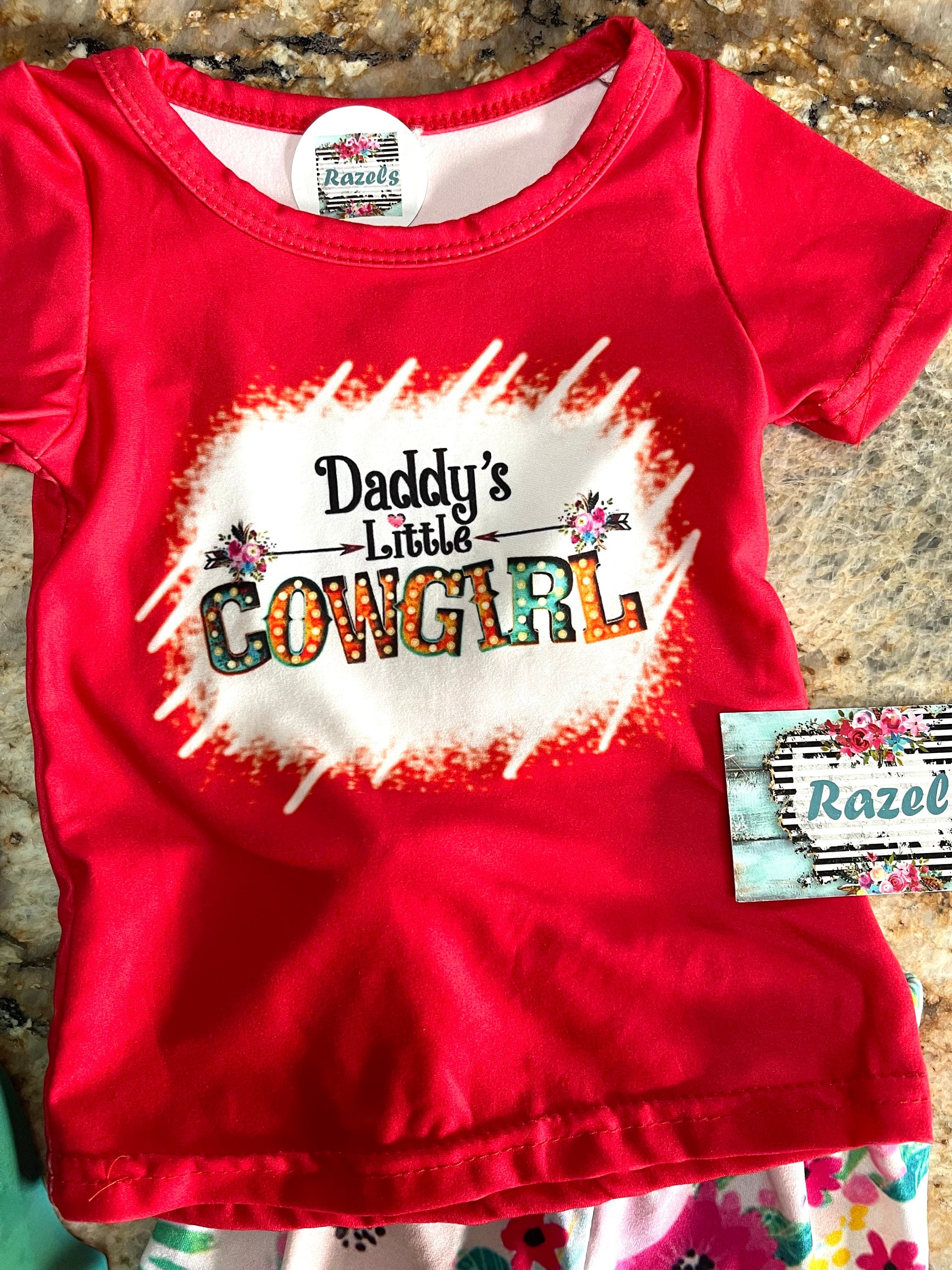 Daddy’s Little Cowgirl Bell Bottom Outfit perfect for Father&#39;s day and all Spring long! This Girls Western T-Shirt & Flower Bell Bottom Pants Set features a red &#39;Daddy&#39;s Little Cowgirl&#39; graphic T-shirt paired with vibrant flower pants bell-bottom style! Ships FREE with $35+ purchase