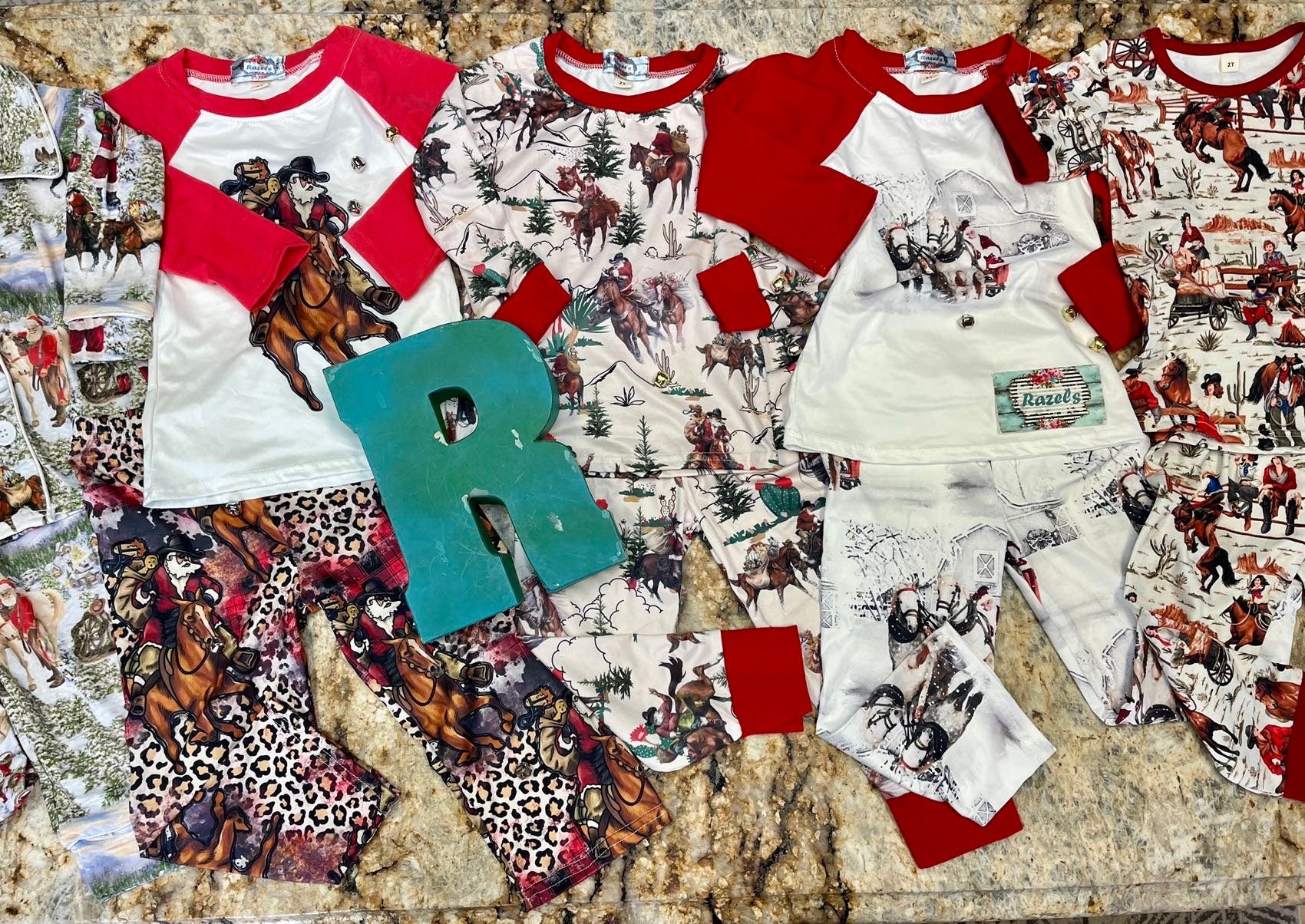 razels collection of western pajamas including cowboy santa, sleigh ride santa, cowgirl and cowboy pajamas
