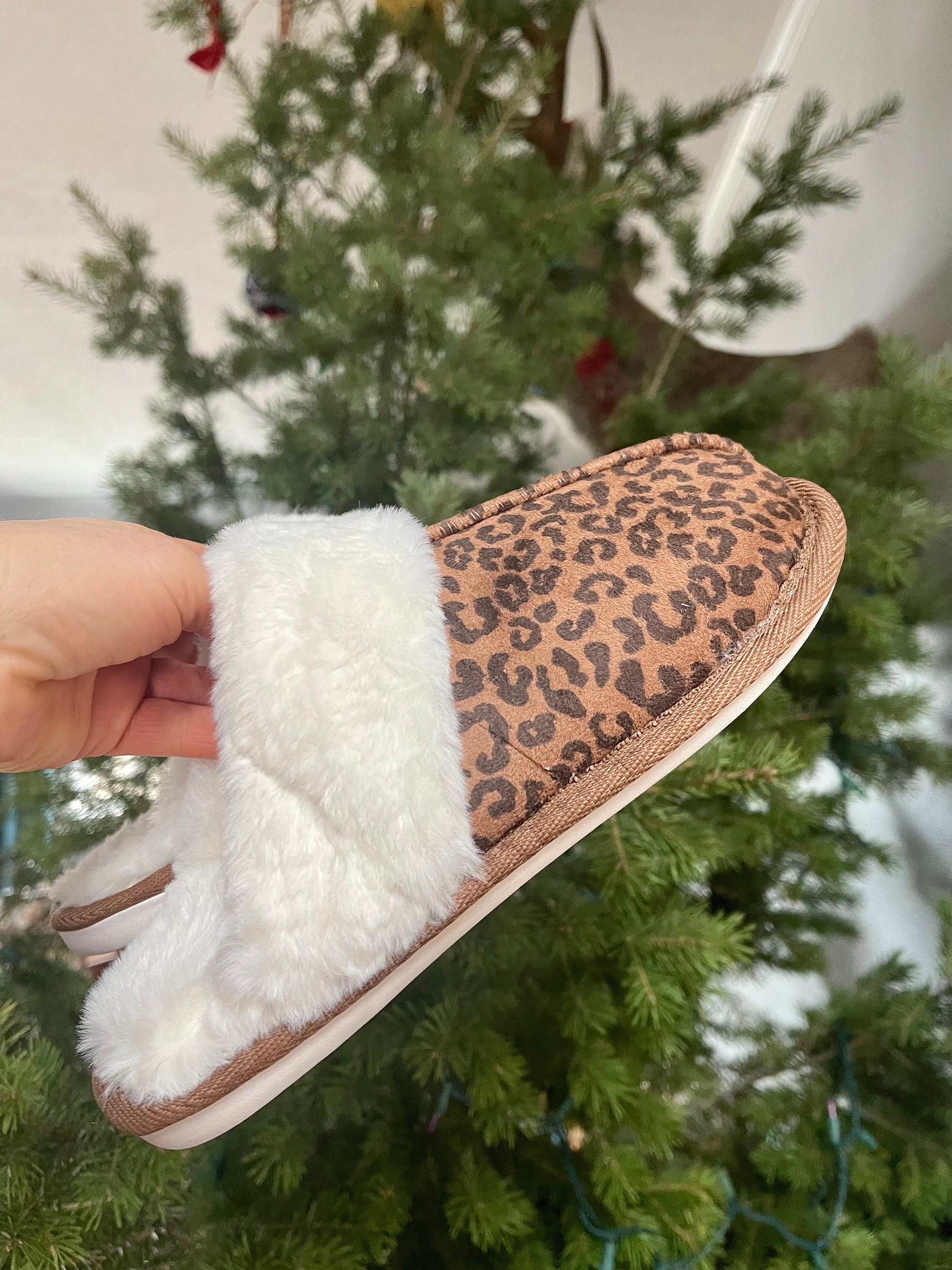 Cheetah Print Slipperswith a rubber sole perfect for inside and outside wear and the softest sherpa lining.