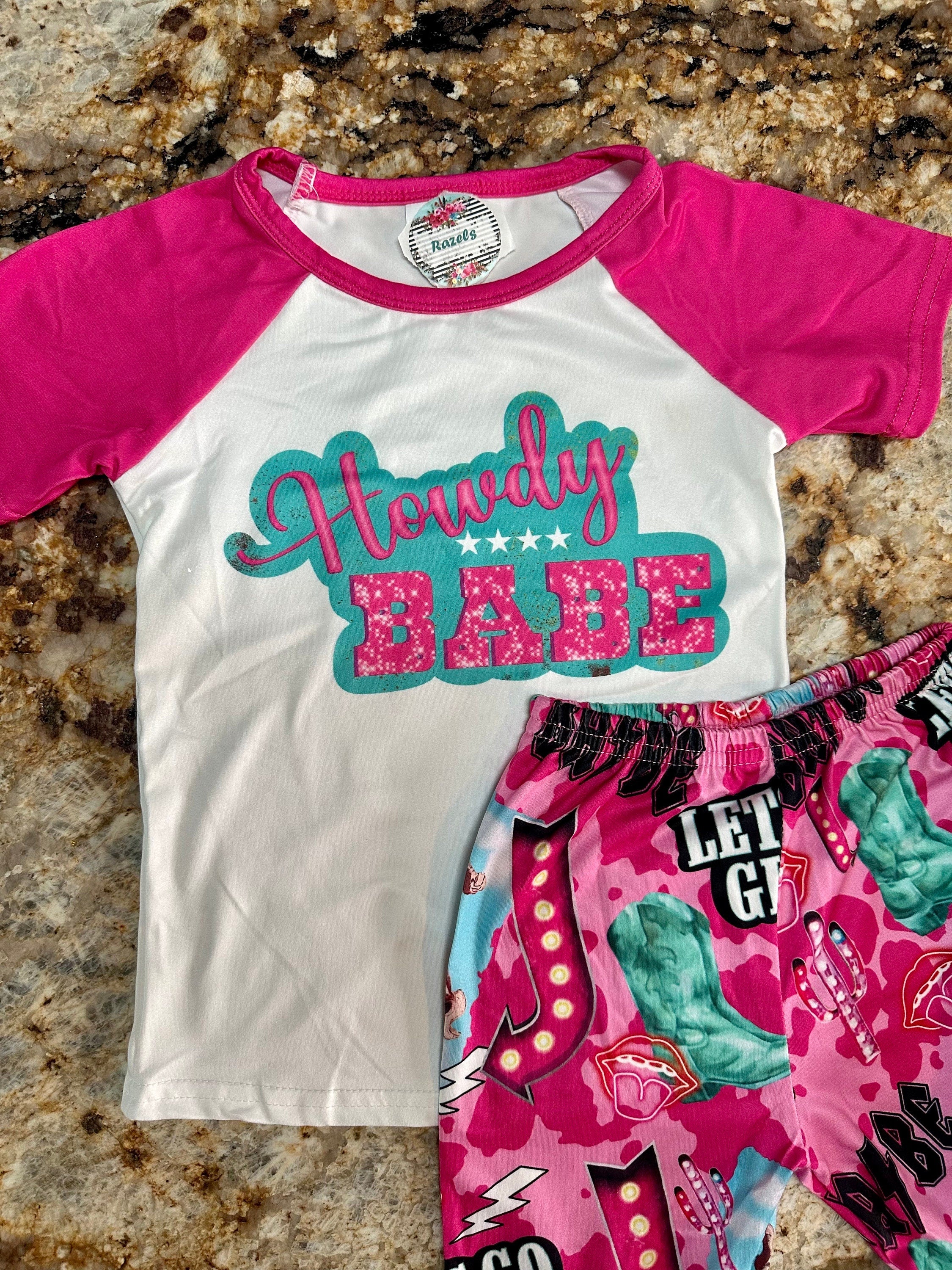 Bell bottom outfit - baseball style t-shirt with HOWDY BABE scrolled across the front and pink sleeves and pink bell bottoms with the funnest cowgirl motif - Let&#39;s go girls, bronc riders, neon signs, turquoise boots, lips and lightning bolts