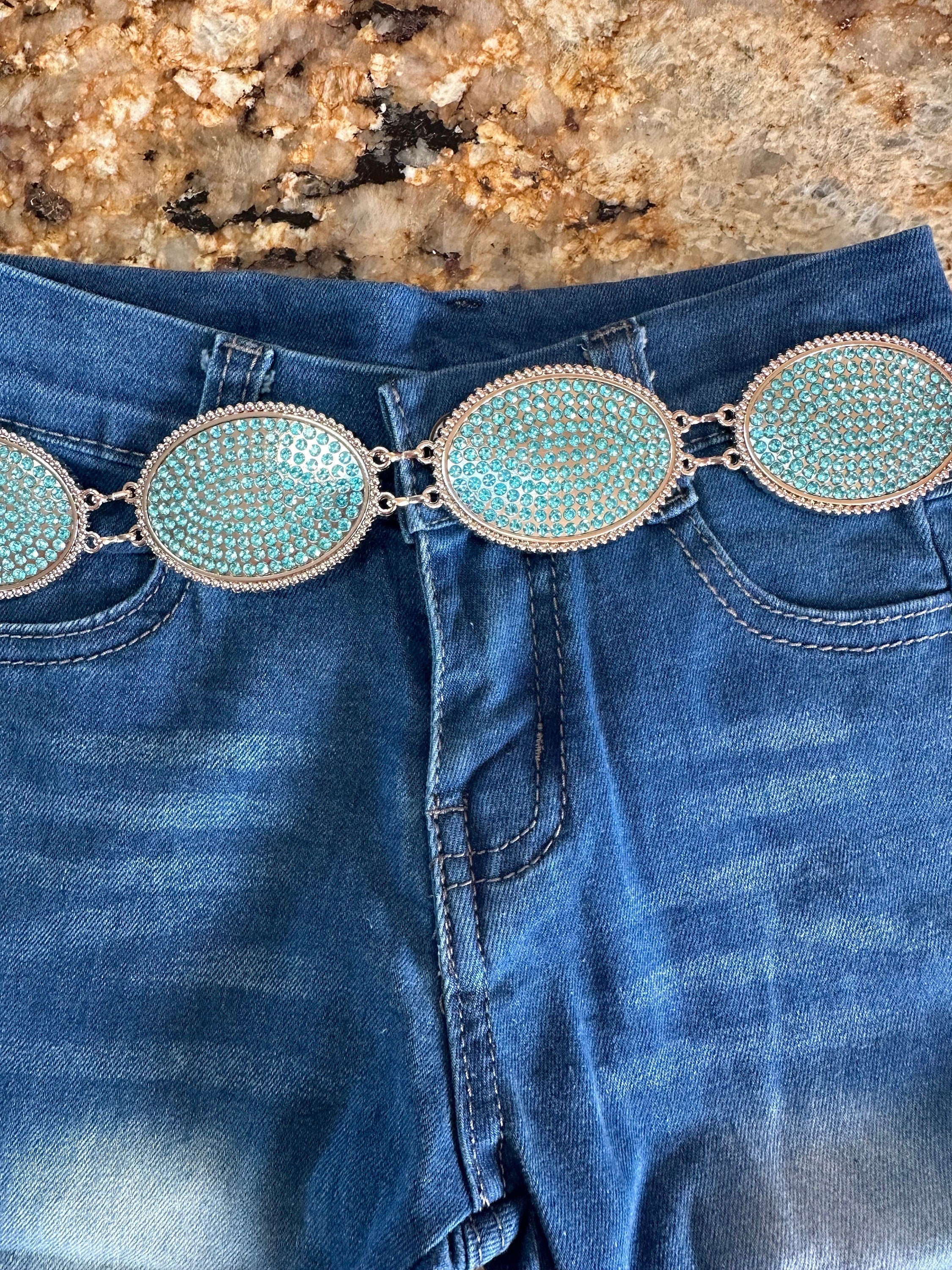 Turquoise Rhinestone Belt for Little Cowgirls! Add a touch of sparkle and Western charm to your little cowgirl’s wardrobe with this fabulous turquoise rhinestone belt! Belt s adjustable 
and makes a great gift!