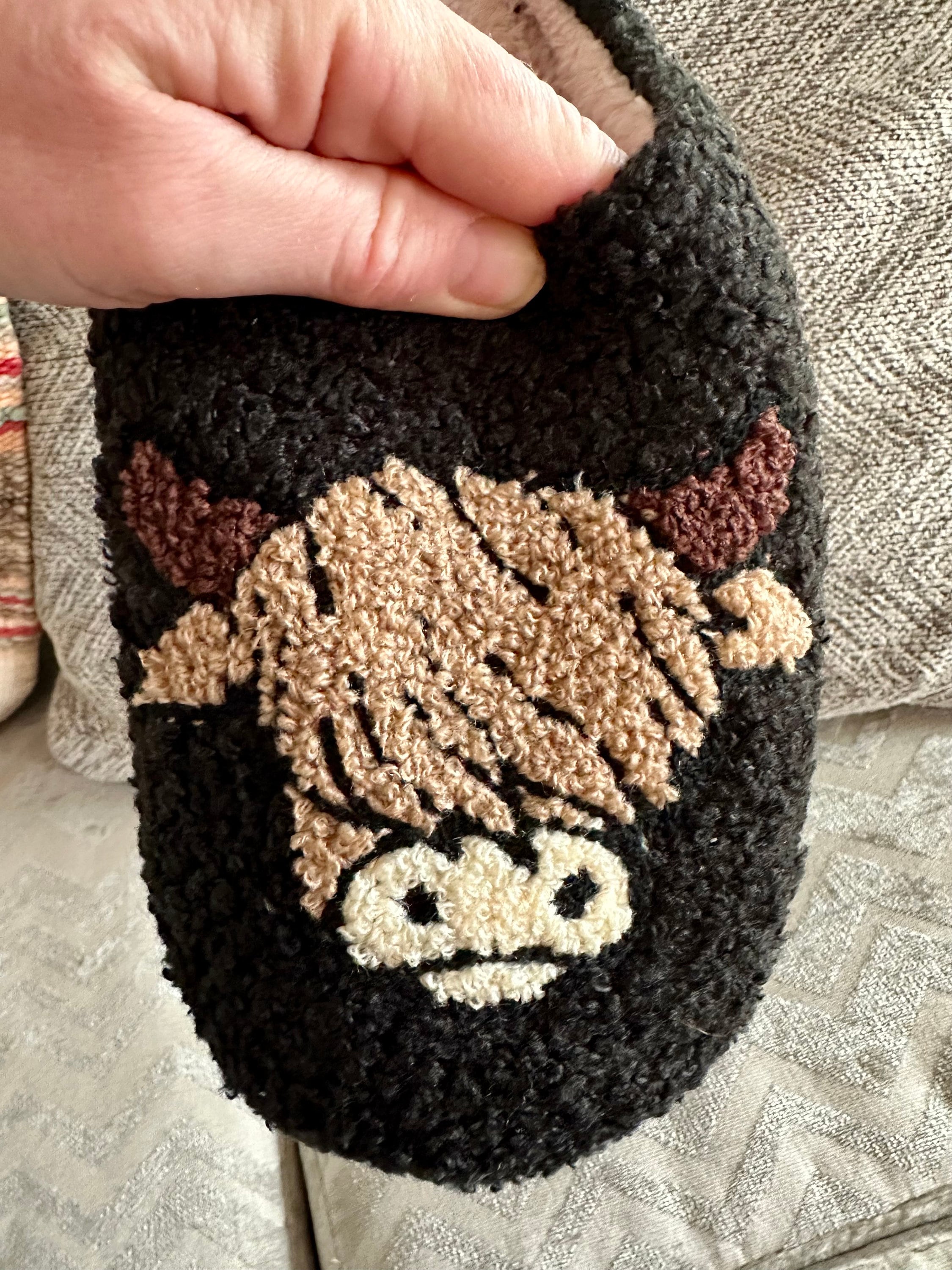 Comfy Scottish Highlander Slippers available in Beige, White and Black. These Western Cow Slippers feature the cutest highlander cow and are so comfy you&#39;ll never take them off! With a rubber sole, you can trek inside and out!