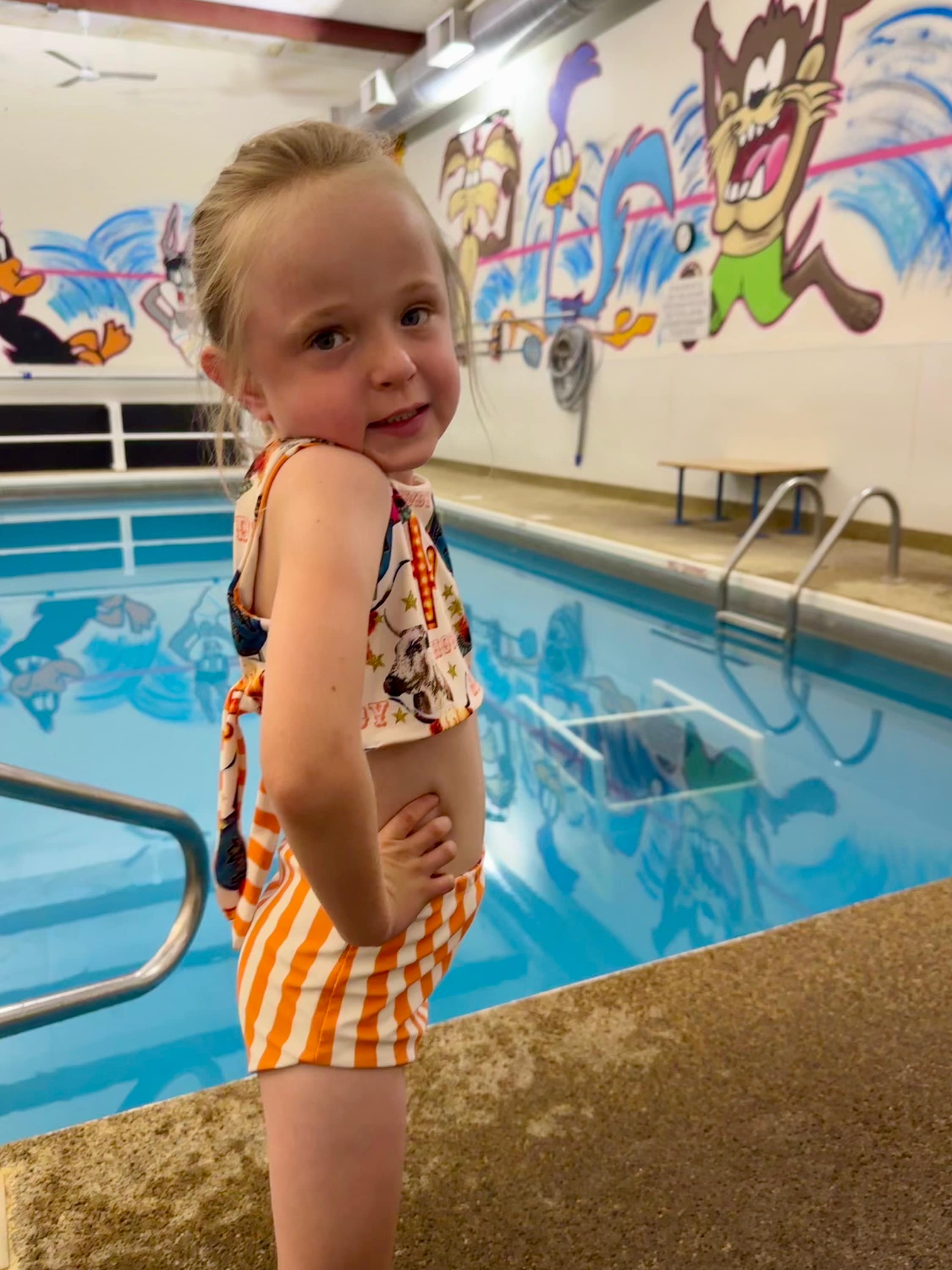 COW GIRL Swimsuit | Western Swimsuits | Striped Swimsuit | REVERSIBLE SWIMSUIT Highland Cow REVERSIBLE Swimsuit &Longhorn Cow Bikini This Western Reversible 2-piece Swimsuit is a must-have for summer fun! One side features the cutest cow-inspired fabric with Scottish Highland Cows, Longhorn Cows, Thunderbirds, and Neon Cactus Signs. Flip it over, and you&#39;ve got bright yellow stripes for a whole new look!  Reversible? Yes! Durable? Absolutely! Fun? 100%!  Available in sizes 0/3 months to 7/8.