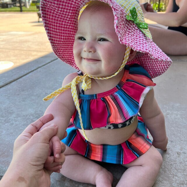 cute girl modeling 2 piece swimsuit