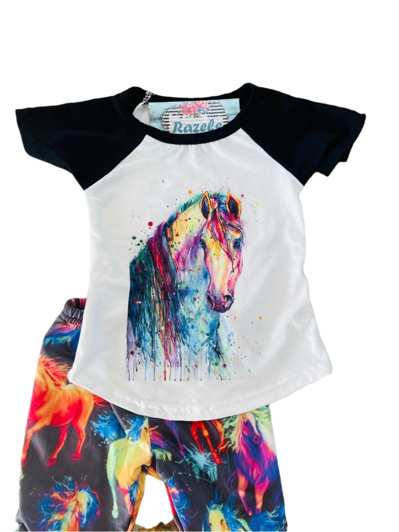 Neon Horse Bell Bottom Outfit -Perfect for Little Cowgirls
bell bottom outfit features a white baseball-style shirt with black sleeves, adorned with a stunning neon horse design, paired with bell-bottom pants showcasing a bold horse print