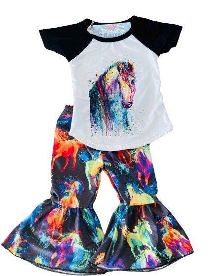 Neon Horse Bell Bottom Outfit -Perfect for Little Cowgirls
bell bottom outfit features a white baseball-style shirt with black sleeves, adorned with a stunning neon horse design, paired with bell-bottom pants showcasing a bold horse print