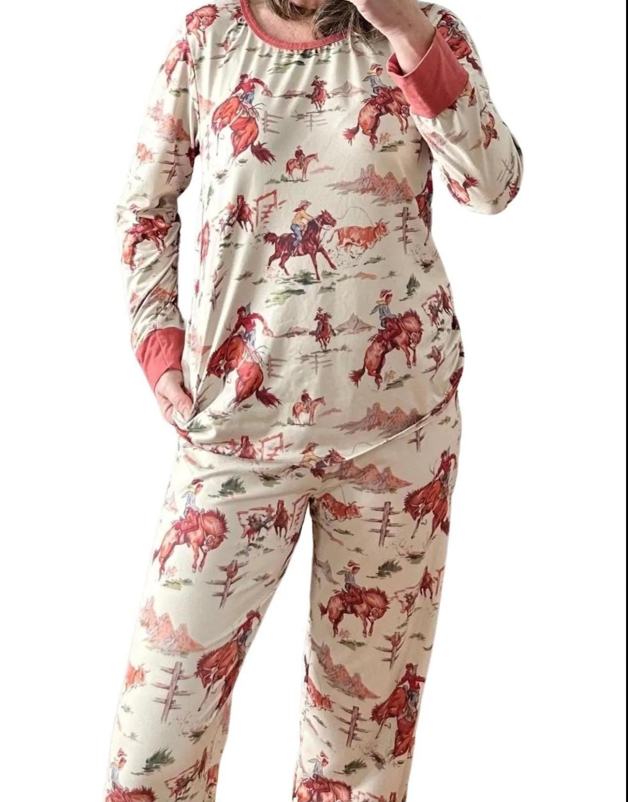 Retro Western Vintage Cowboy Pajamas: Bring the rodeo home with these Classic Western Pajamas from Razels! Featuring a vintage cowboy print with bucking broncs, roping steers, and steer wrestling. Available in baby 3/6 months - adult 4x! Ships FREE.