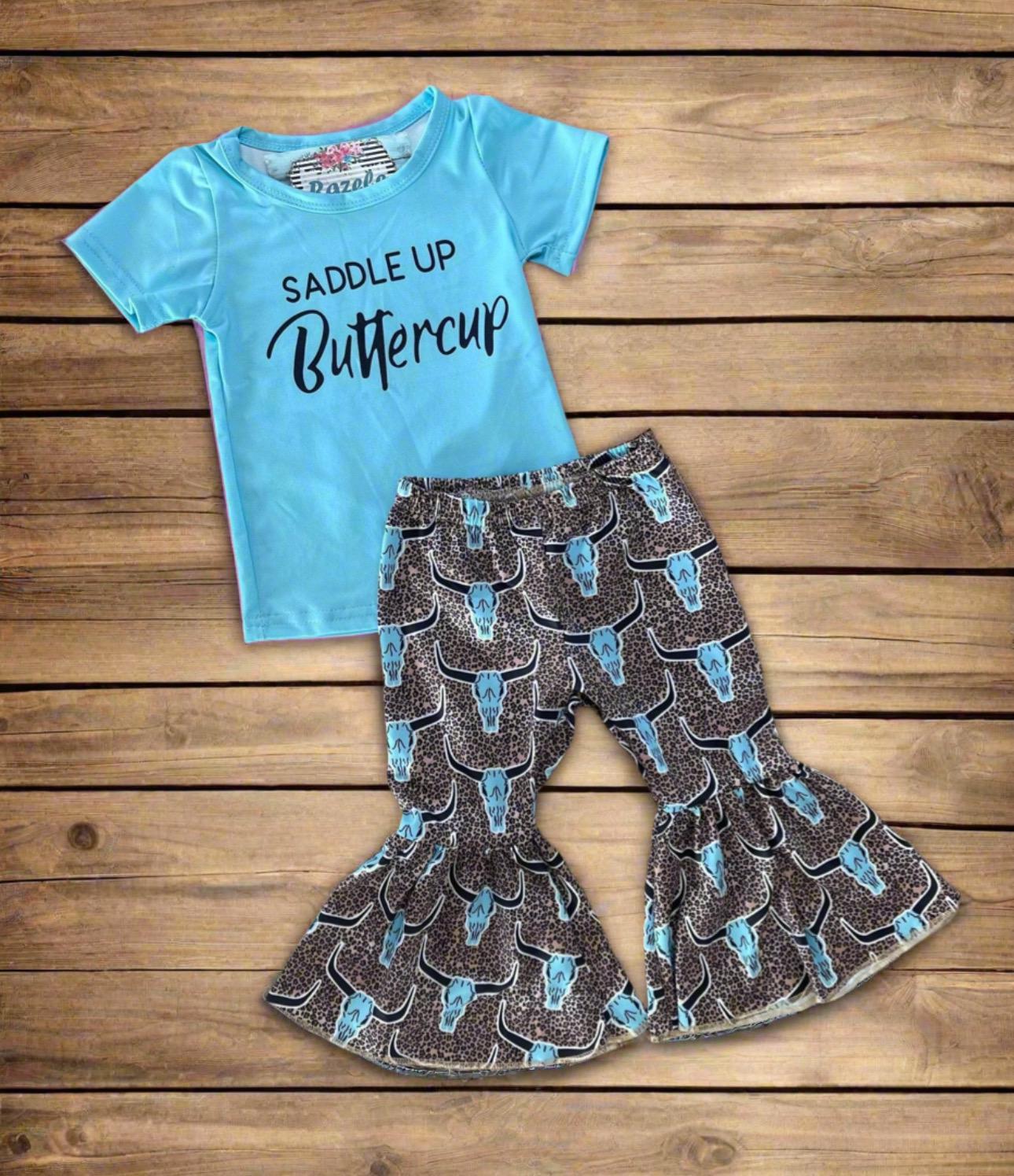 Saddle Up Buttercup! Girls Bell Bottom Outfit, Cowgirl Outfit, Turquoise T-Shirt & Cow Skull Cheetah Print Flares. Featuring a vibrant turquoise t-shirt and flared cow skull cheetah print bell bottoms - a showstopper for any Western-loving girl.