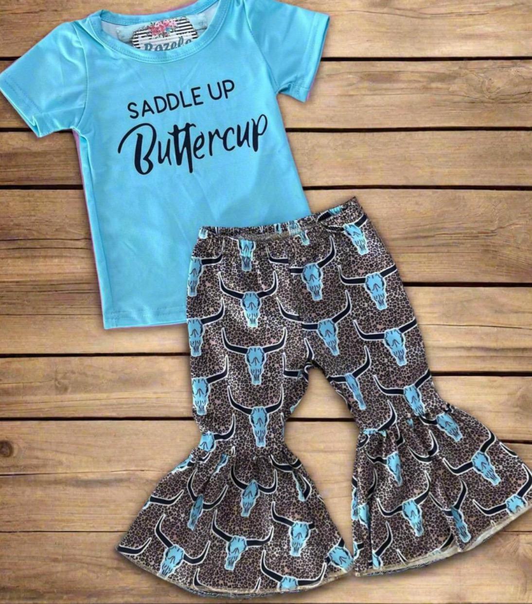 Saddle Up Buttercup! Girls Bell Bottom Outfit, Cowgirl Outfit, Turquoise T-Shirt & Cow Skull Cheetah Print Flares. Featuring a vibrant turquoise t-shirt and flared cow skull cheetah print bell bottoms - a showstopper for any Western-loving girl.