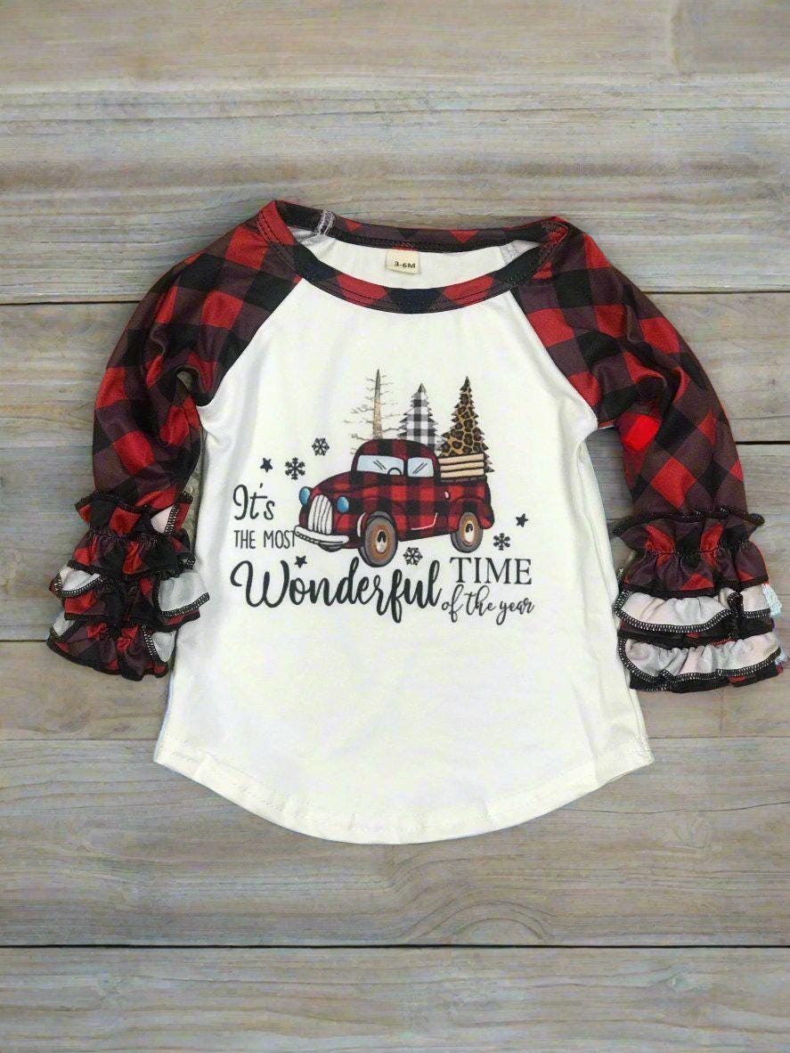 girls christmas outfits featuring red and black checkered buffalo plaid trouser pants and your choice of Merry Christmas or It&#39;s the Most Wonderful Time of the Year Long Sleeve Shirts