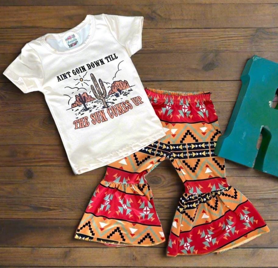 🌅 Ain’t Goin’ Down ’Til The Sun Comes Up – Bell Bottom Cowgirl Set (Girls 8/9 Only) | CLOSEOUT $10!

“Ain’t goin’ down ’til the sun comes up!”
And neither is she! 😂 Your little wild one is gonna shine in this rodeo-ready bell bottom outfit that’s full of spunk and Southwestern sass.

✨ Only size 8/9 left – and once it&#39;s gone, it&#39;s GONE! Final closeout price: just $10!