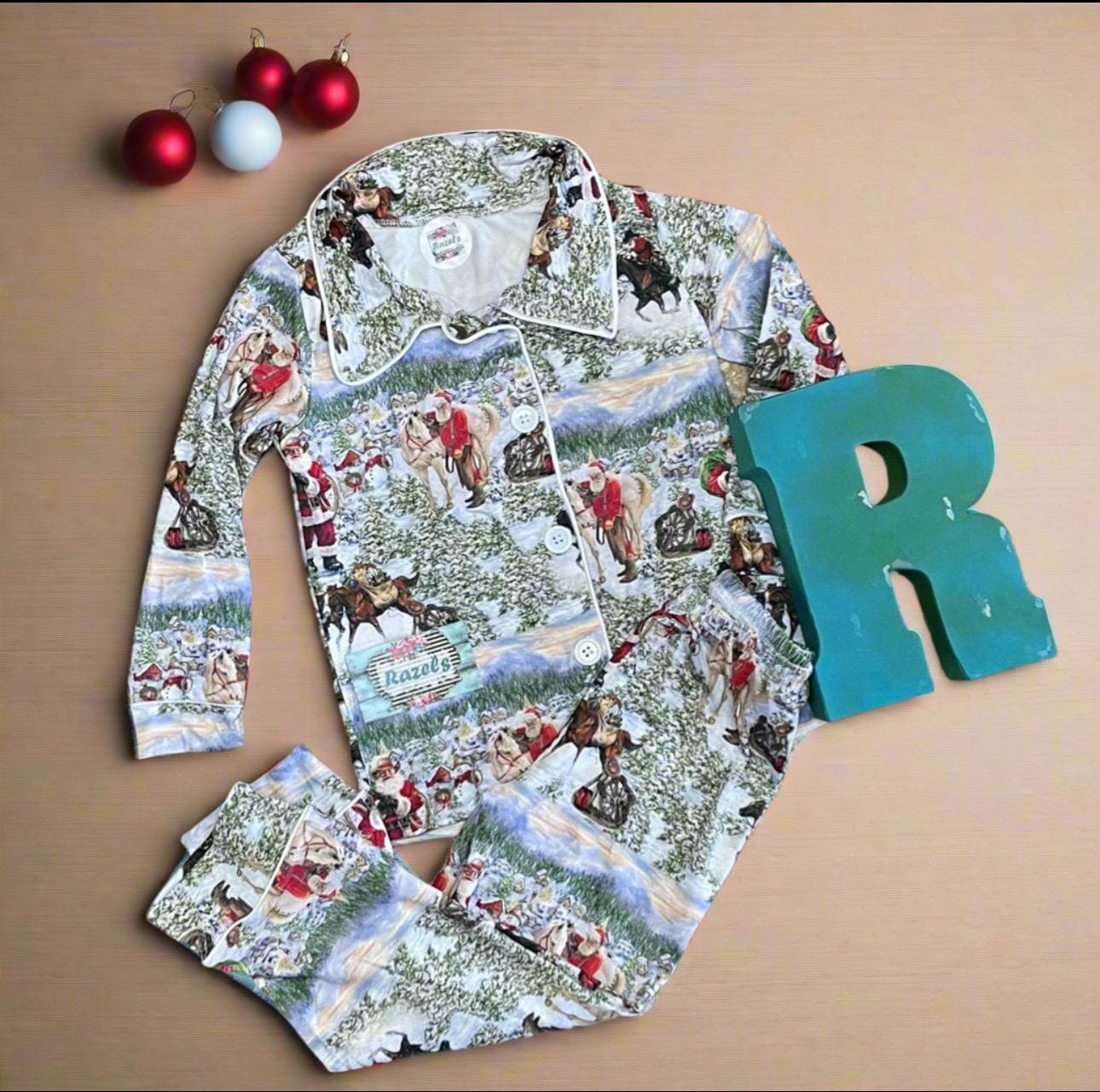 ORIGINAL Cowboy Santa Pajamas featuring Western Santa and his best horses. This button-down pajama style is perfect for the whole family.