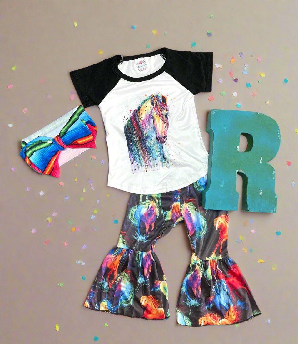 Neon Horse Bell Bottom Outfit -Perfect for Little Cowgirls
bell bottom outfit features a white baseball-style shirt with black sleeves, adorned with a stunning neon horse design, paired with bell-bottom pants showcasing a bold horse print