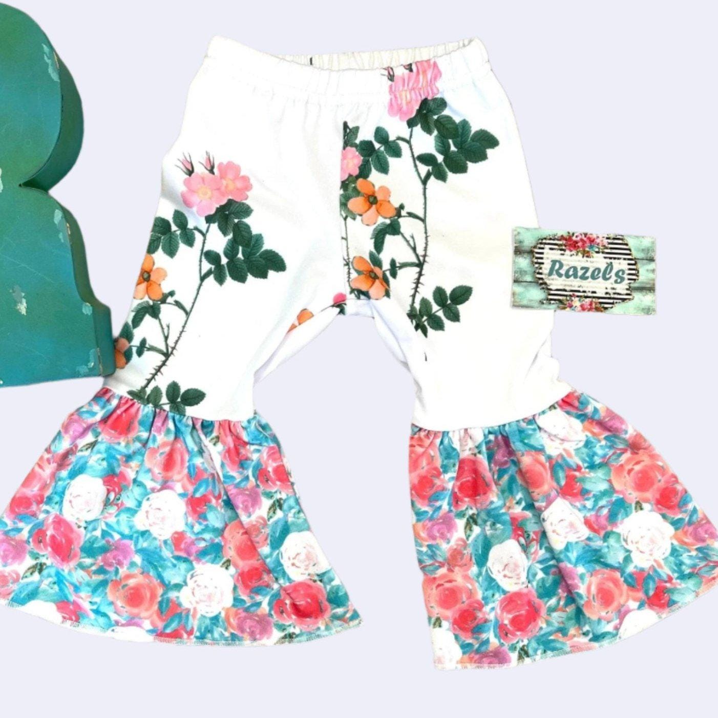 Floral Bell Bottoms designed with vibrant flower patterns and fun, playful colors are made with high-quality materials that promise comfort and durability, ensuring they’ll be a favorite all season long. These Wildflower pants will not disappoint!