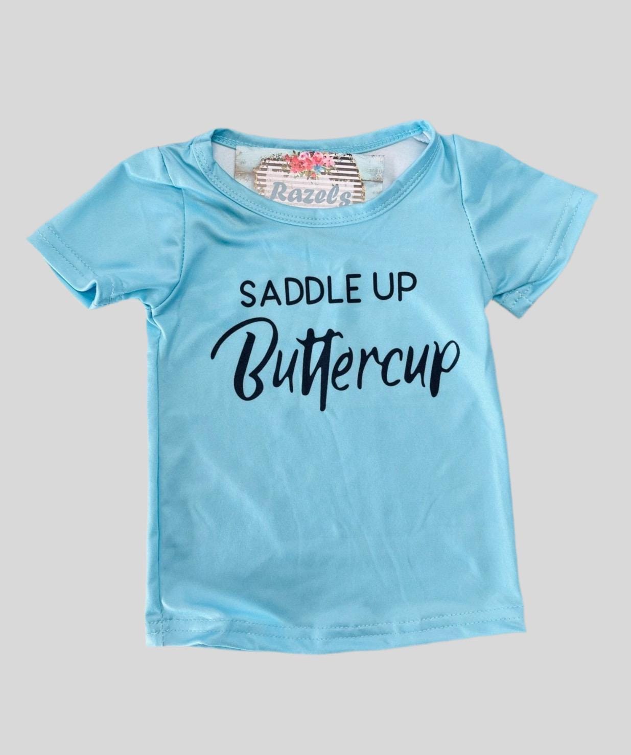 Saddle Up Buttercup! Girls Bell Bottom Outfit, Cowgirl Outfit, Turquoise T-Shirt & Cow Skull Cheetah Print Flares. Featuring a vibrant turquoise t-shirt and flared cow skull cheetah print bell bottoms - a showstopper for any Western-loving girl.