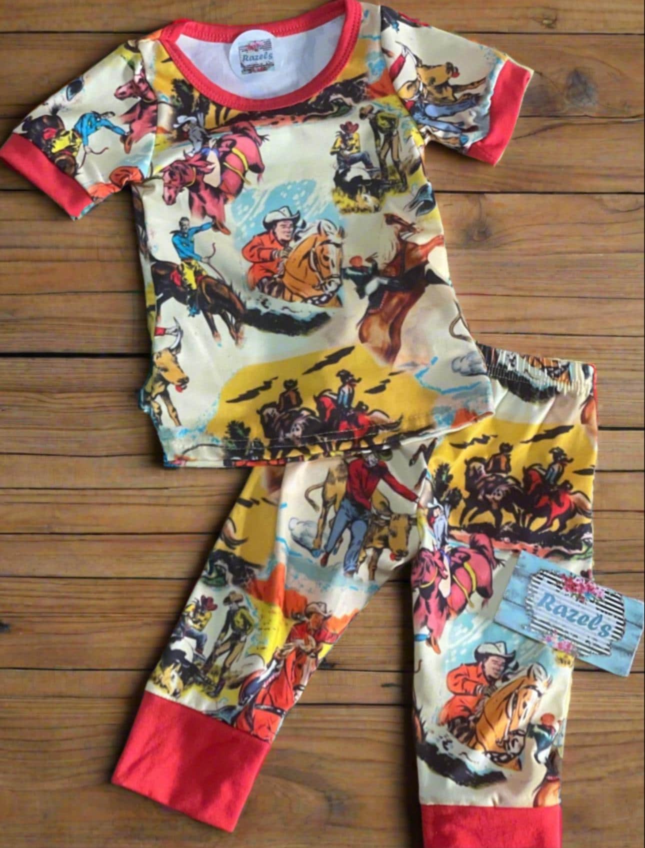 retro print cowboy pajamas, short sleeve top with red cuffs and matching red hem cuffs on pajama pants