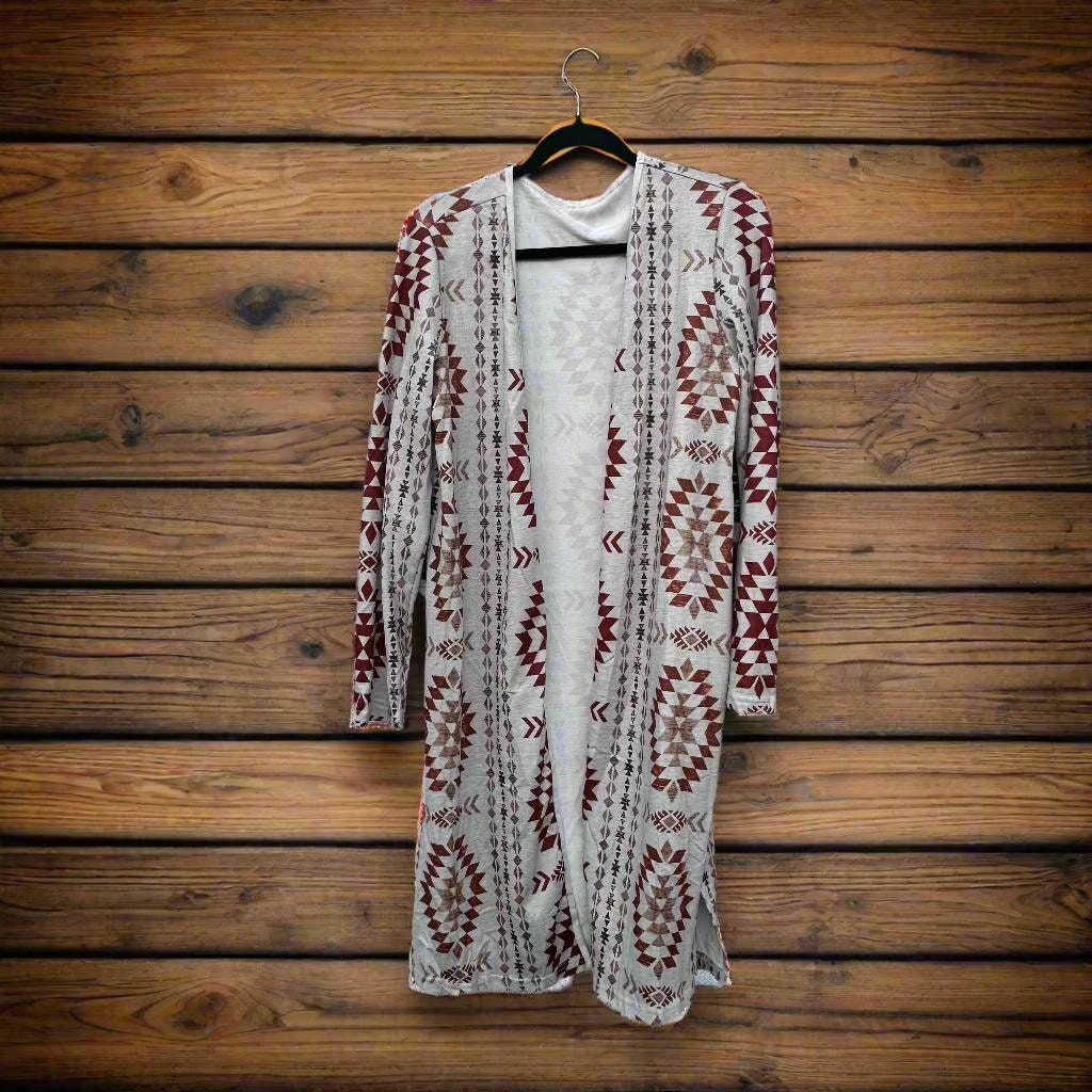 Western Aztec Print Cardigan – Cozy Fall Layering Piece
features an Aztec print throughout, and an open front design. This Western Cardigan offers versatile styling options, making it the perfect layering piece for any outfit.