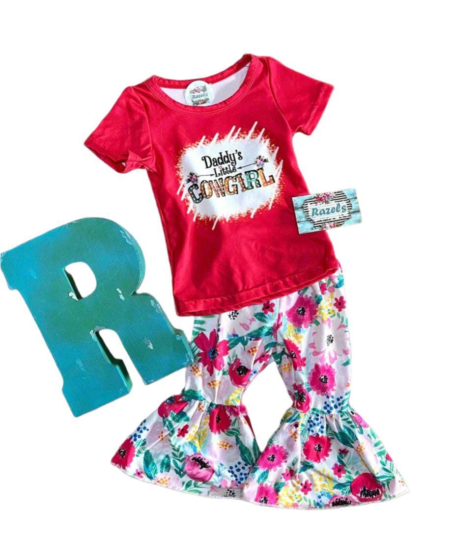 Daddy’s Little Cowgirl Bell Bottom Outfit perfect for Father&#39;s day and all Spring long! This Girls Western T-Shirt & Flower Bell Bottom Pants Set features a red &#39;Daddy&#39;s Little Cowgirl&#39; graphic T-shirt paired with vibrant flower pants bell-bottom style! Ships FREE with $35+ purchase