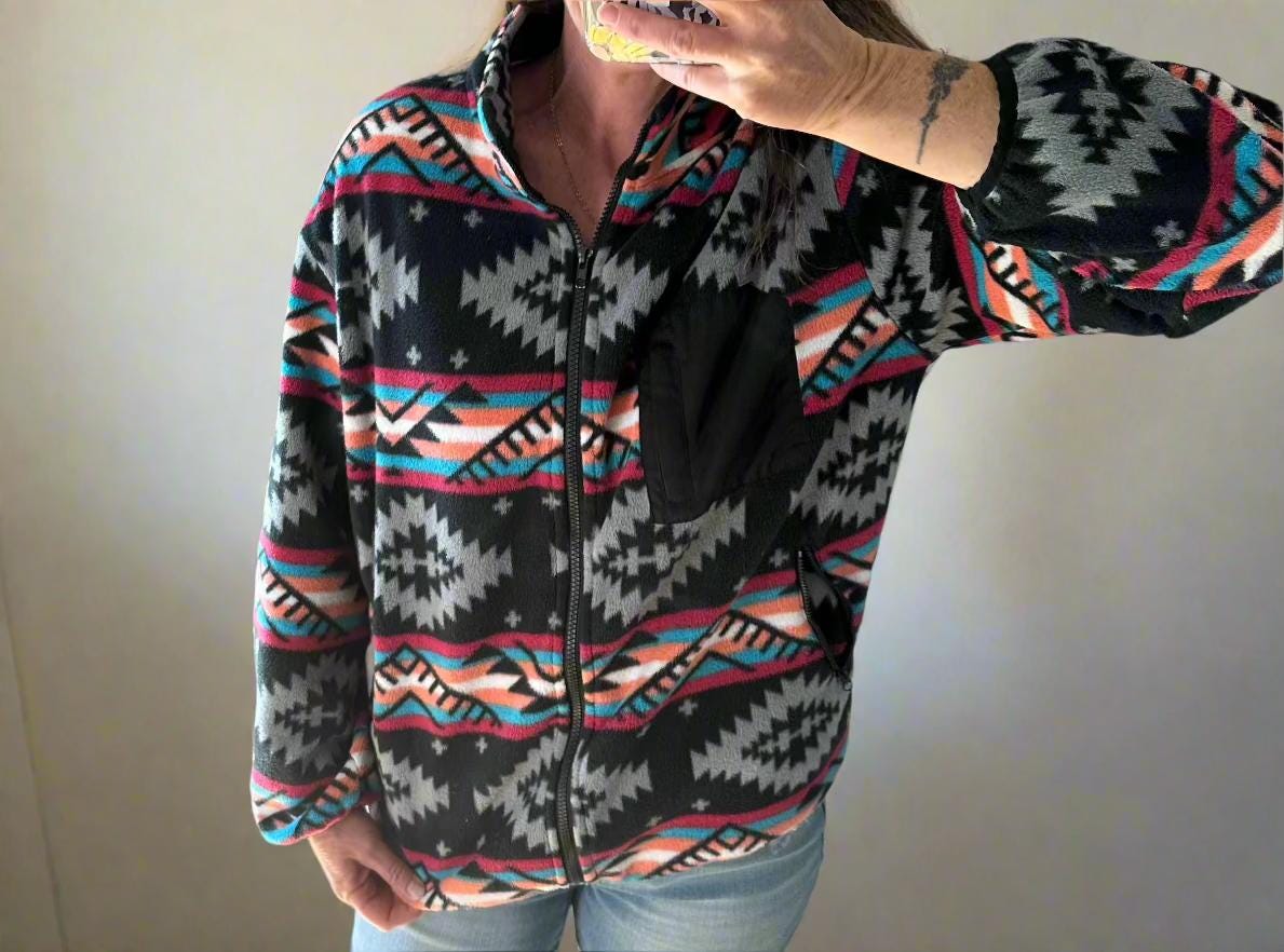 Western Fleece Jacket, Aztec Fleece Jacket, Spring Fleece Jacket, Western Zip Up features a vibrant Aztec print in black, grey, hot pink, orange, and turquoise pattern.  With a convenient zip-up design, this jacket is perfect for all seasons.