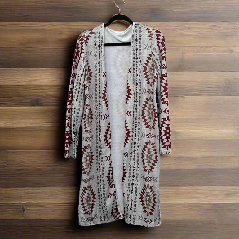 Western Aztec Print Cardigan – Cozy Fall Layering Piece
features an Aztec print throughout, and an open front design. This Western Cardigan offers versatile styling options, making it the perfect layering piece for any outfit.