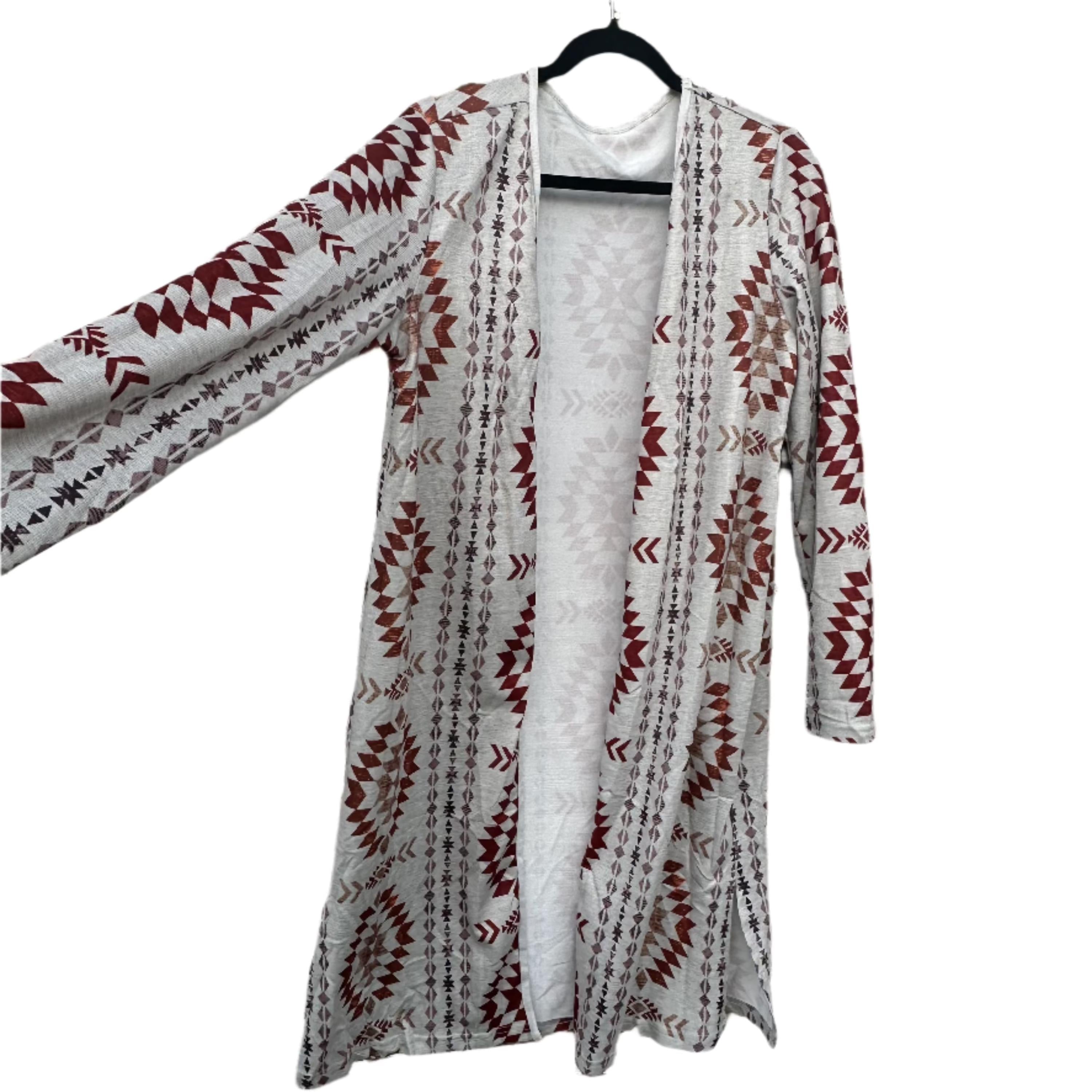 Western Aztec Print Cardigan – Cozy Fall Layering Piece
features an Aztec print throughout, and an open front design. This Western Cardigan offers versatile styling options, making it the perfect layering piece for any outfit.