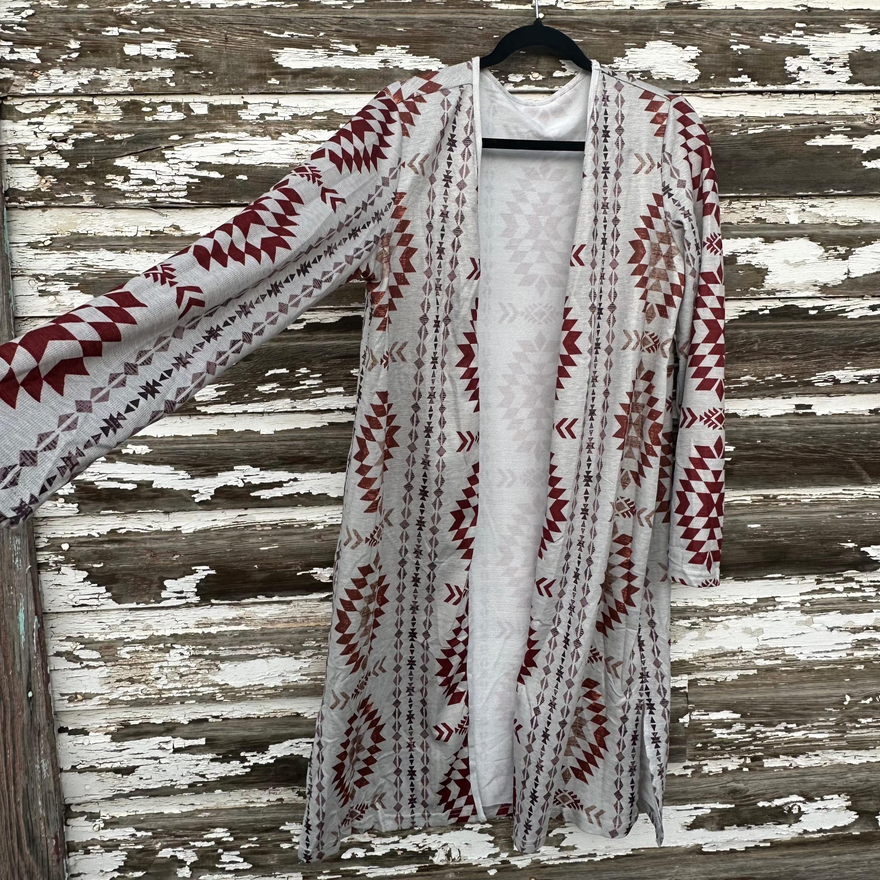 Western Aztec Print Cardigan – Cozy Fall Layering Piece
features an Aztec print throughout, and an open front design. This Western Cardigan offers versatile styling options, making it the perfect layering piece for any outfit.