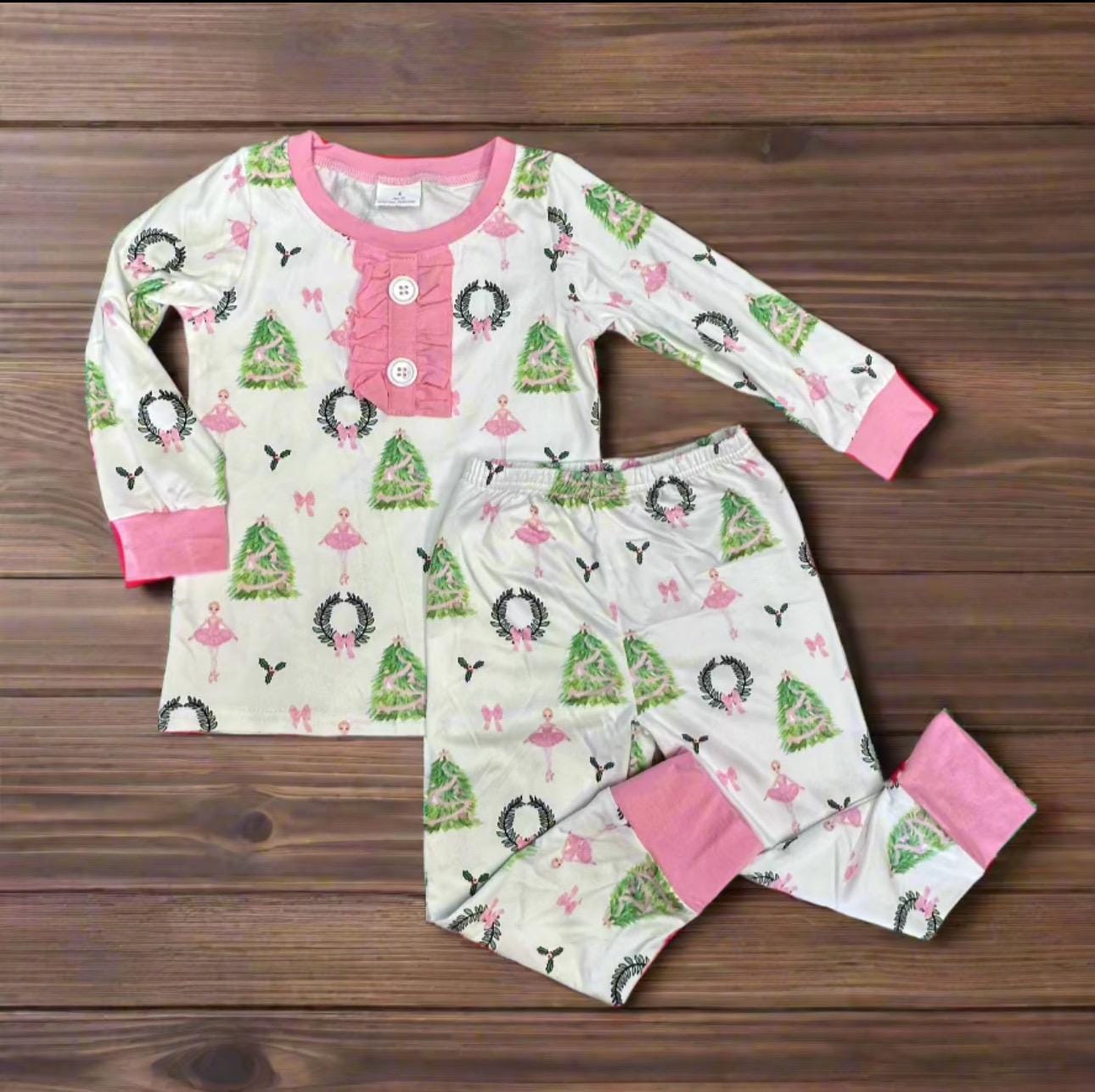 These pink Christmas pajamas are perfect for your little ballerina! 🎀✨ Ballerina Christmas Pajamas

✔ Adorable Design: Features a dancing ballerina, festive Christmas trees, and pink ruffles for extra charm. BUY at Razels. Only $34