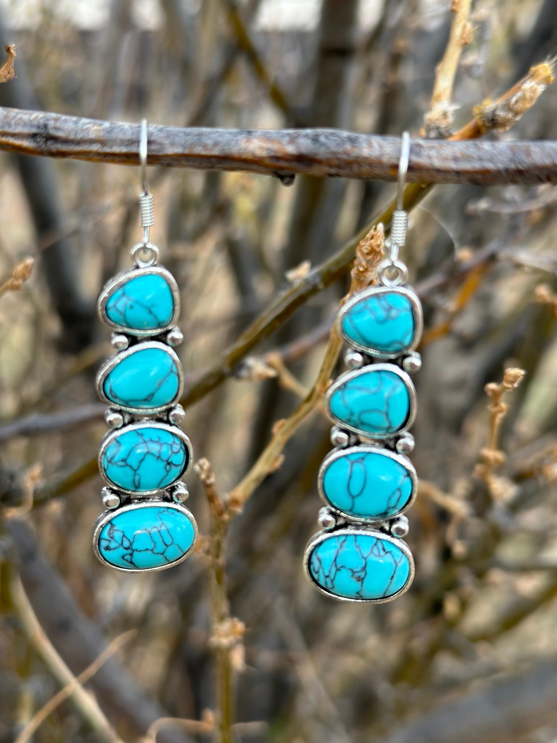 Cowgirl Style Turquoise Stacked Dangle Earrings. Featuring a unique stacked design with four beautiful stones, these 2-inch dangles bring a bold, eye-catching style that’s perfect for any cowgirl at heart. Great Christmas gift for HER!