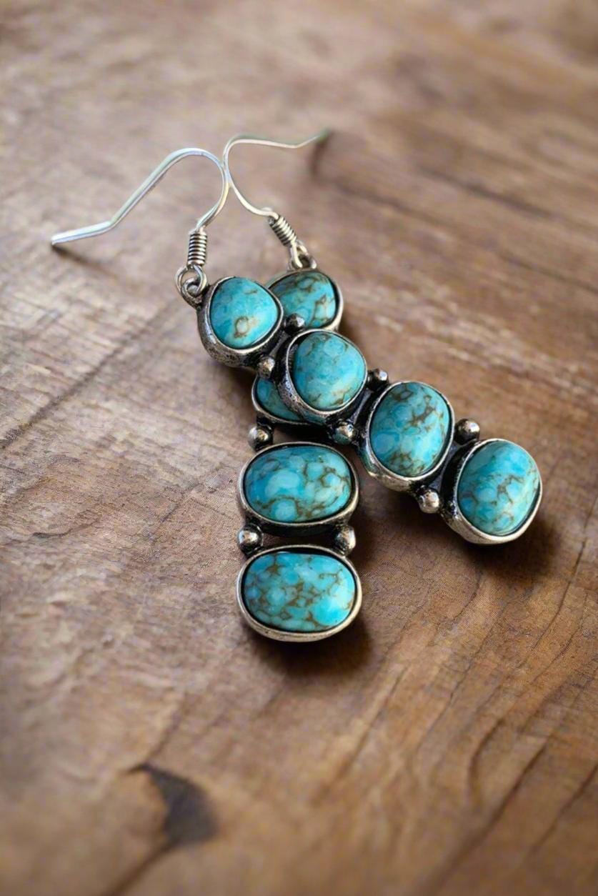 Cowgirl Style Turquoise Stacked Dangle Earrings. Featuring a unique stacked design with four beautiful stones, these 2-inch dangles bring a bold, eye-catching style that’s perfect for any cowgirl at heart. Great Christmas gift for HER!