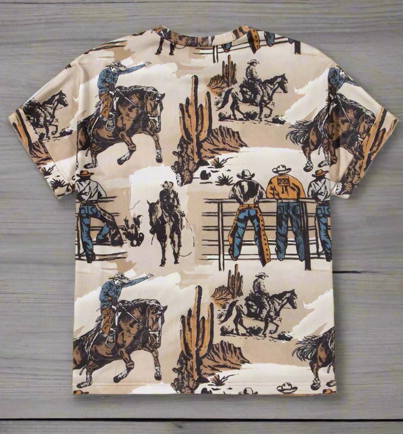 COWBOY T-Shirt for Women! This Western T-Shirt features a bold, allover unique cowboy print, making it perfect for every day! Oversized with a relaxed fit, this tee is soft and comfy, pairing perfectly with leggings, jeggings, biker shorts, and more.