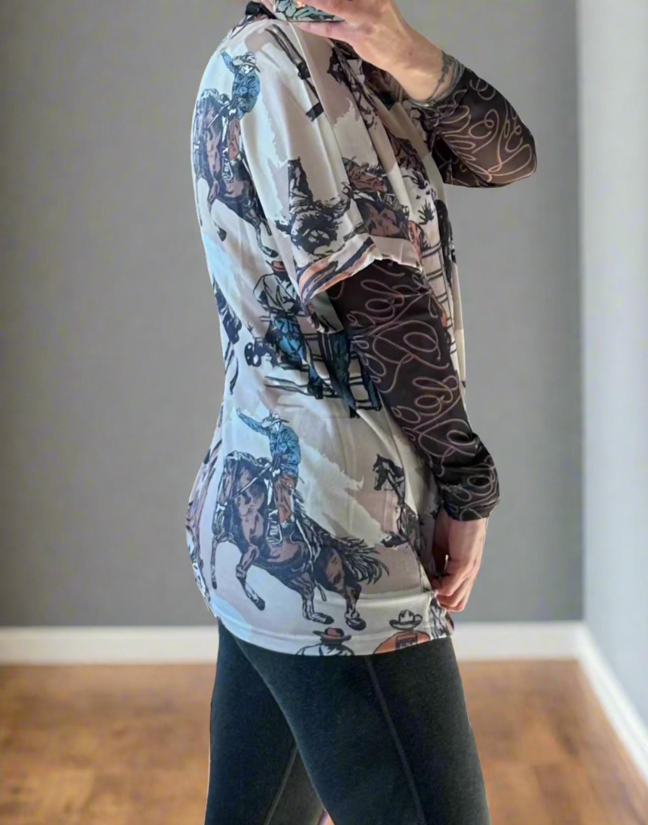 COWBOY T-Shirt for Women! This Western T-Shirt features a bold, allover unique cowboy print, making it perfect for every day! Oversized with a relaxed fit, this tee is soft and comfy, pairing perfectly with leggings, jeggings, biker shorts, and more.