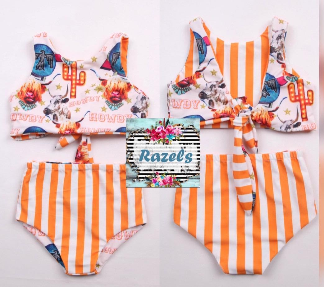 COW GIRL Swimsuit | Western Swimsuits | Striped Swimsuit | REVERSIBLE SWIMSUIT Highland Cow REVERSIBLE Swimsuit &Longhorn Cow Bikini This Western Reversible 2-piece Swimsuit is a must-have for summer fun! One side features the cutest cow-inspired fabric with Scottish Highland Cows, Longhorn Cows, Thunderbirds, and Neon Cactus Signs. Flip it over, and you&#39;ve got bright yellow stripes for a whole new look!  Reversible? Yes! Durable? Absolutely! Fun? 100%!  Available in sizes 0/3 months to 7/8.