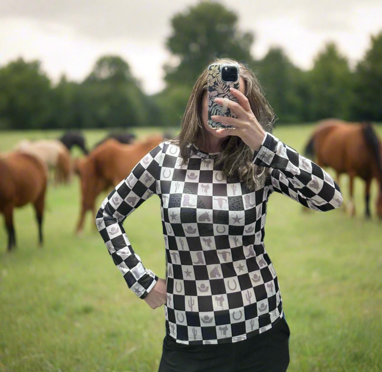 Western Mesh Shirt | Cowgirl Shirt | Women&#39;s Sheer Western Layering Top - Unleash your inner cowgirl with a bold, modern twist! This Western Mesh Shirt blends classic Western fashion with edgy, contemporary style. Designed for layering, this long-sleeve sheer top features a striking checkerboard print that adds effortless flair to any outfit.
✔ Breathable & Lightweight 
✔ Unique Checkerboard Print 
✔ Perfect for Layering 
✔ High Elasticity for a Flattering Fit
SHIPS FREE W/ $35+