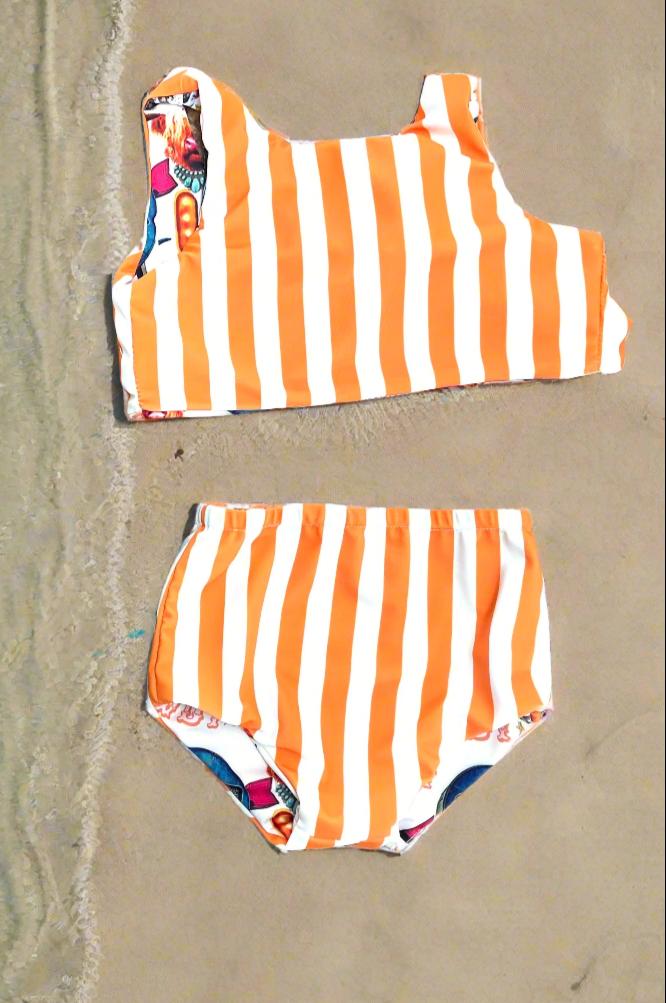 COW GIRL Swimsuit | Western Swimsuits | Striped Swimsuit | REVERSIBLE SWIMSUIT Highland Cow REVERSIBLE Swimsuit &Longhorn Cow Bikini This Western Reversible 2-piece Swimsuit is a must-have for summer fun! One side features the cutest cow-inspired fabric with Scottish Highland Cows, Longhorn Cows, Thunderbirds, and Neon Cactus Signs. Flip it over, and you&#39;ve got bright yellow stripes for a whole new look!  Reversible? Yes! Durable? Absolutely! Fun? 100%!  Available in sizes 0/3 months to 7/8.