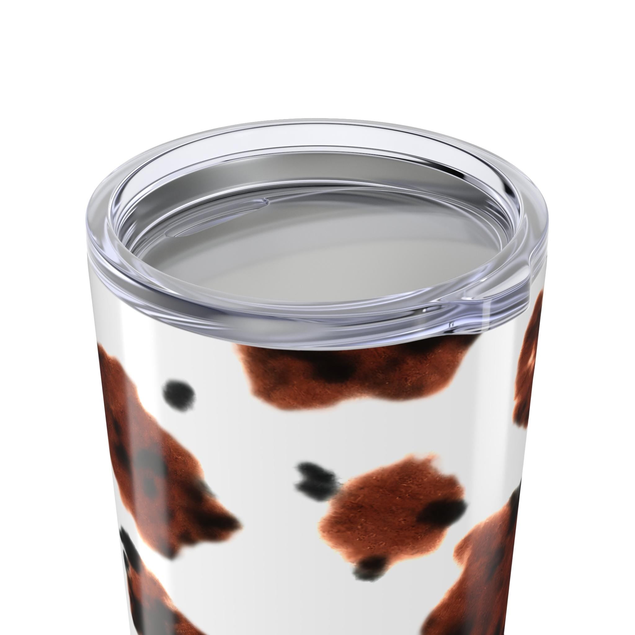 Our personalized cow print tumbler features your custom name wrapped in the cutest brown brindle pattern.  this 20oz stainless steel tumbler has you covered—literally—with a secure, vacuum-insulated lid. 🌼

✓ Add your name for a custom touch that’s udderly adorable 🌿
✓ Double-walled stainless steel keeps drinks hot or cold for hours
✓ Glossy finish shows off the bold cow print in all its glory ✨
✓ Vacuum-insulated with clear push-on lid—perfect for life on the go ☕