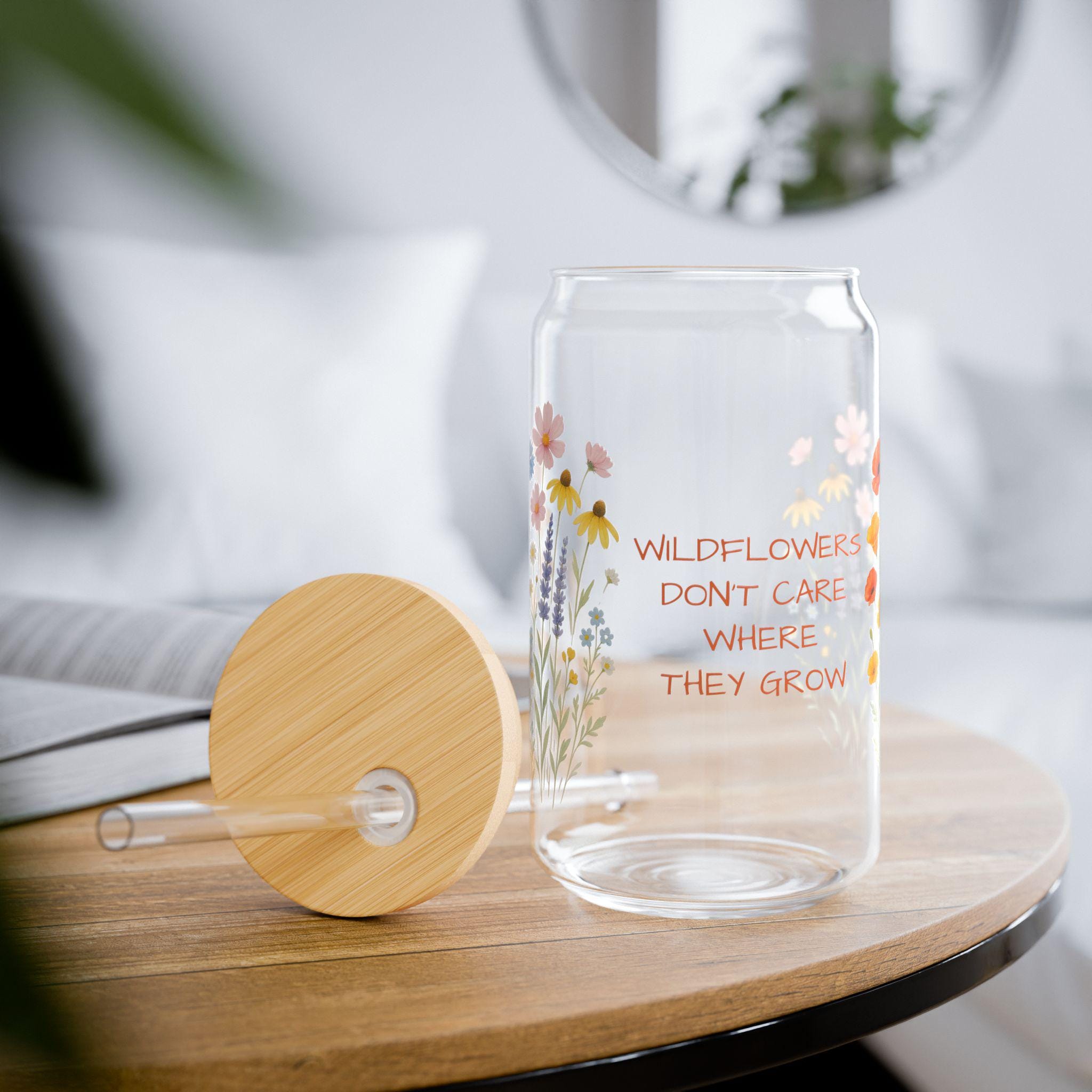 WILDFLOWERS DON&#39;T CARE WHERE THEY GROW—and now your drinkware can bloom just as freely. Whether you&#39;re enjoying iced coffee on the porch or lemonade in the sunshine, this floral glass adds a little joy to every sip.  Features you&#39;ll love: ✓ Custom name or phrase printed among the wildflowers ✓ 16 oz clear tempered glass with a vibrant floral design ✓ Optional bamboo lid + eco-friendly Tritan straw 🥤 ✓ BPA-free and proudly made in the USA ✓ Durable, reusable, and perfect for summer s