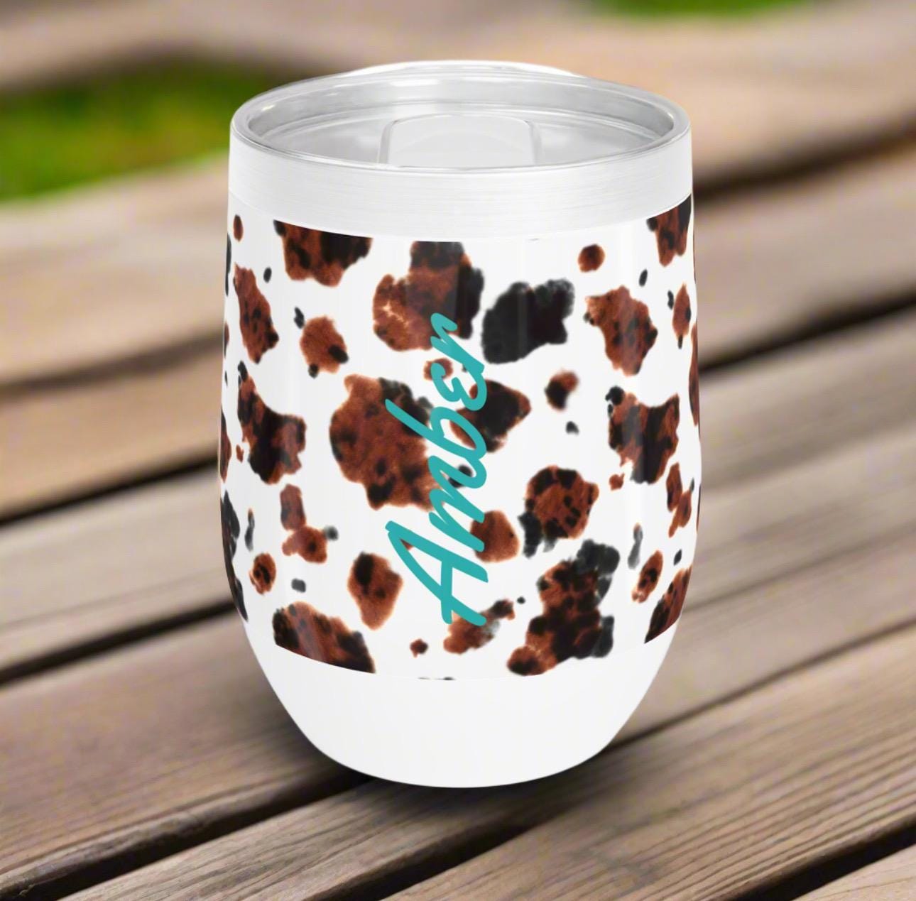 Perfect for sunny picnics, backyard BBQs, front porch lounging, or a quiet evening with your favorite wine—this cup goes wherever you do.

✅ 12oz size, just right for wine, cocktails, or iced coffee
✅ Double-wall vacuum insulated to keep drinks cold up to 12 hours (and hot for 6!)
✅ Durable stainless steel construction with a horizontal stipple texture
✅ Personalized full-wrap design—make it yours!
✅ BPA-free clear lid with slide closure for easy, no-spill sipping