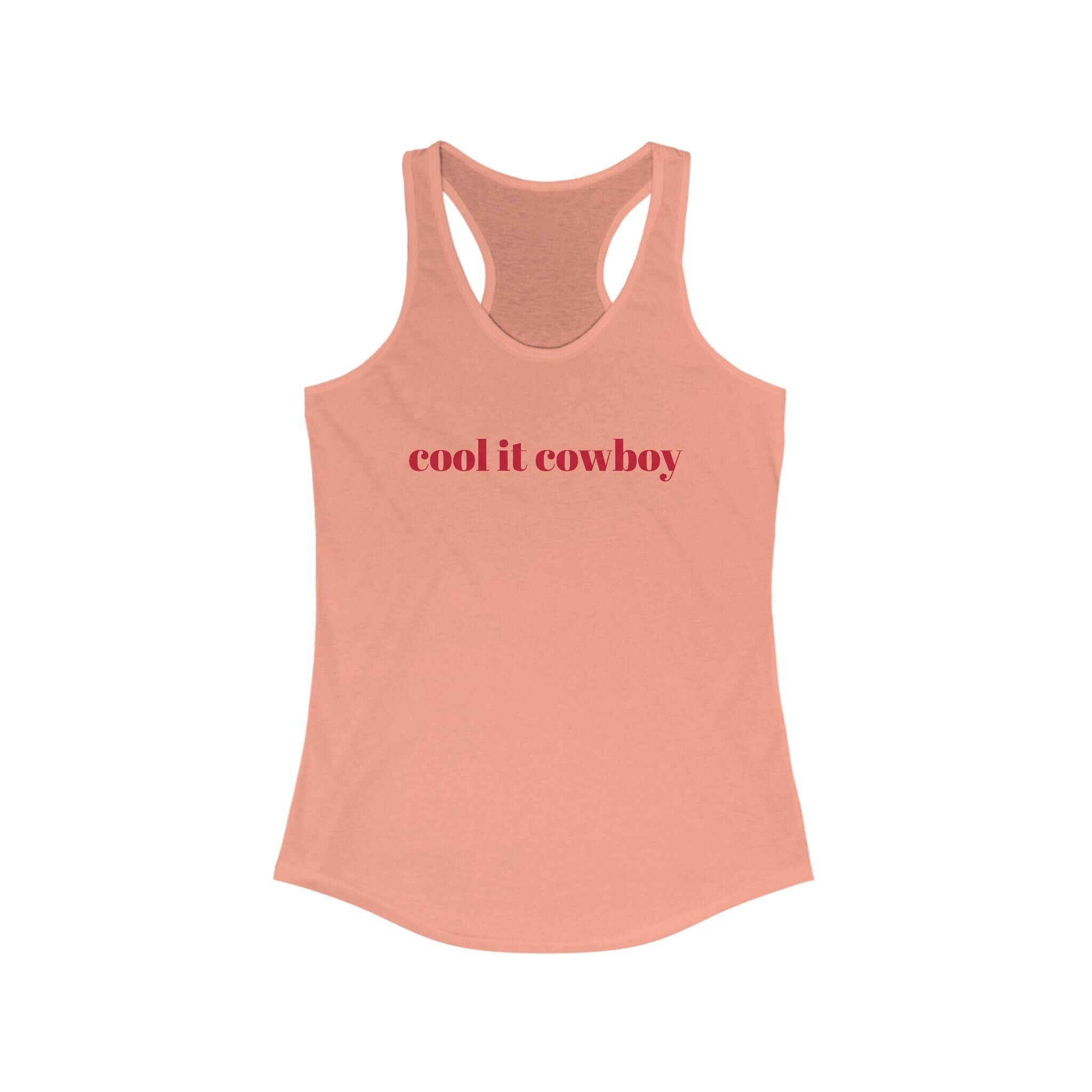 🤠 Cool It Cowboy – Western Racerback Tank for Women
Our spicy fan-favorite saying “Cool It Cowboy” is now heat-pressed on your new go-to racerback tank! 
Available in 7 gorgeous colors, it’s soft, breathable, and ready to ride with you from gym sesh to grocery run. 
✓ Lightweight & breathable (4 oz cotton/poly blend)
✓ Soft feel with comfy self-fabric binding
✓ Flattering scoop neckline + racerback cut
✓ Tear-away label for no-itch wear
✓ Great for workouts, errands, or casual Western vibes