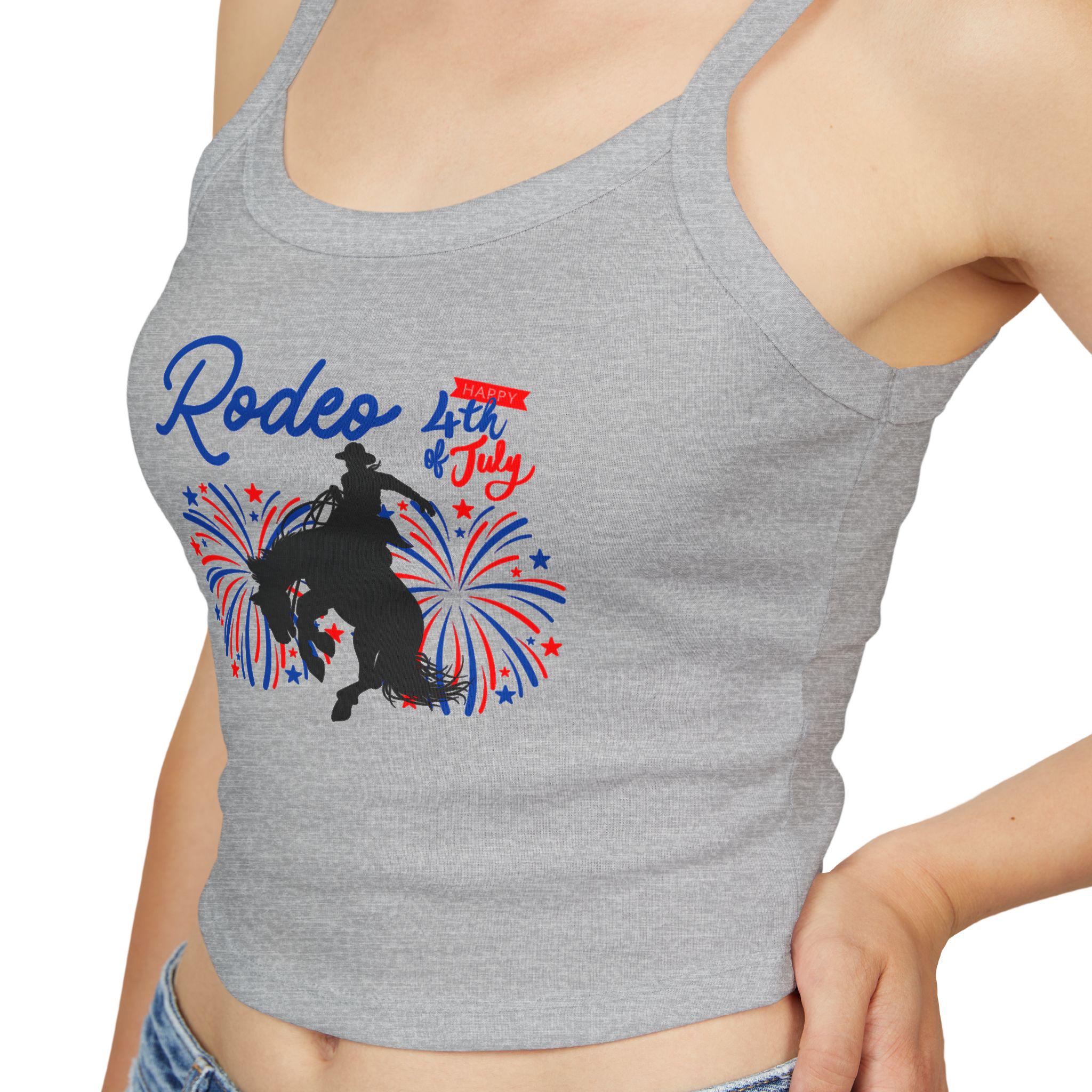 Rodeo Crop Tank – Bronc Rider & Fireworks for the 4th of July
Celebrate Independence Day with a little rodeo flair! This cropped spaghetti strap tank features our bold bronc rider silhouette bursting through red, white, and blue fireworks—perfect for cowgirls who love freedom, fashion, and a little yeehaw energy 🤠🎆

Made from a buttery-soft cotton blend with supportive thick straps, it’s made for sunny parades, backyard BBQs, or dancing under fireworks.
