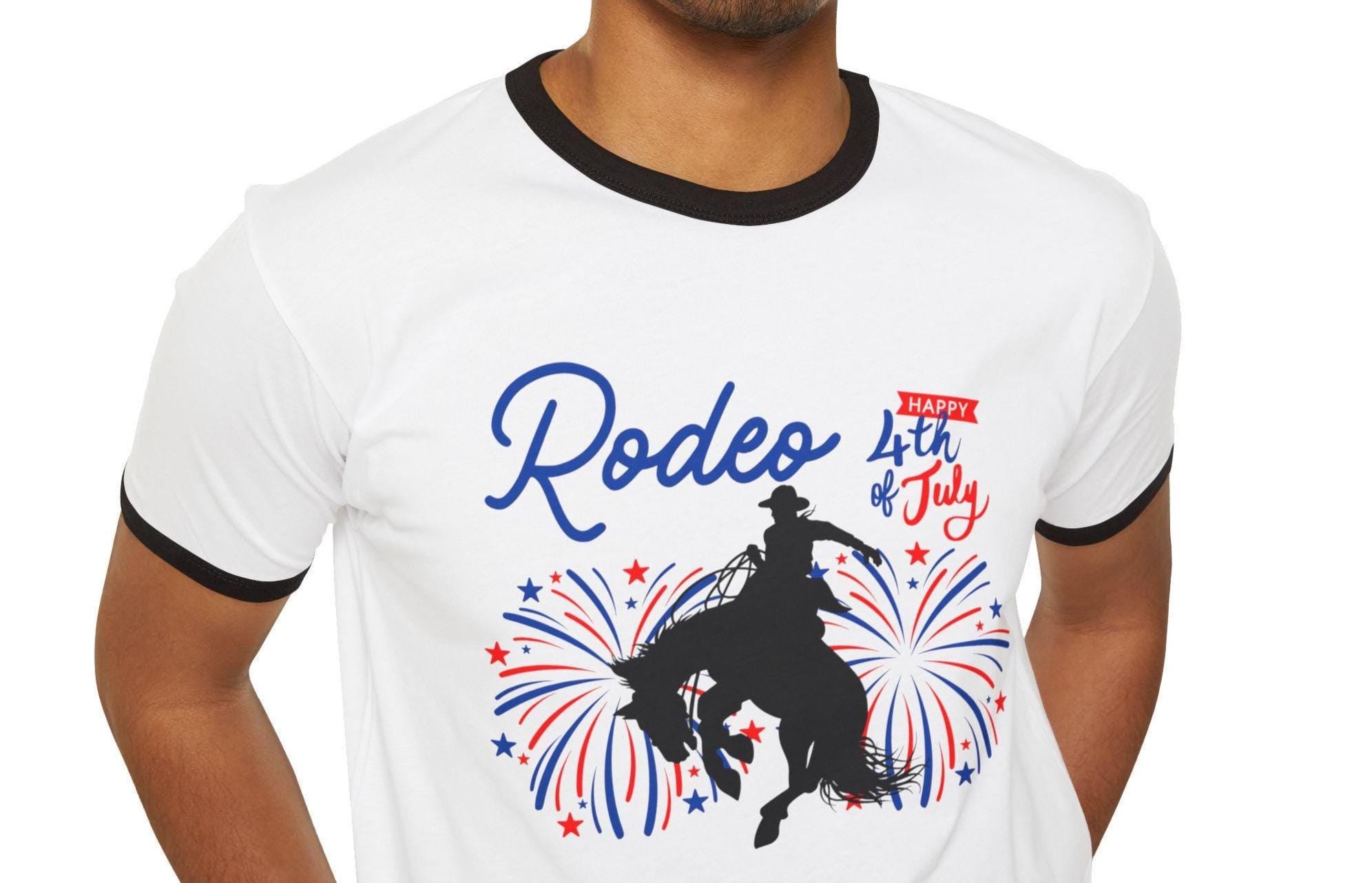 This classic ringer tee brings serious rodeo energy to your Independence Day look. Featuring a cowboy bronc silhouette lit up by red, white, and blue fireworks, plus bold RODEO and Happy 4th of July text—it’s loud, proud, and made for the kind of summer day that ends with fireworks and dust in your boots.

✓ 100% combed, ring-spun cotton – soft + breathable
✓ Contrasting baby rib collar & sleeve trim