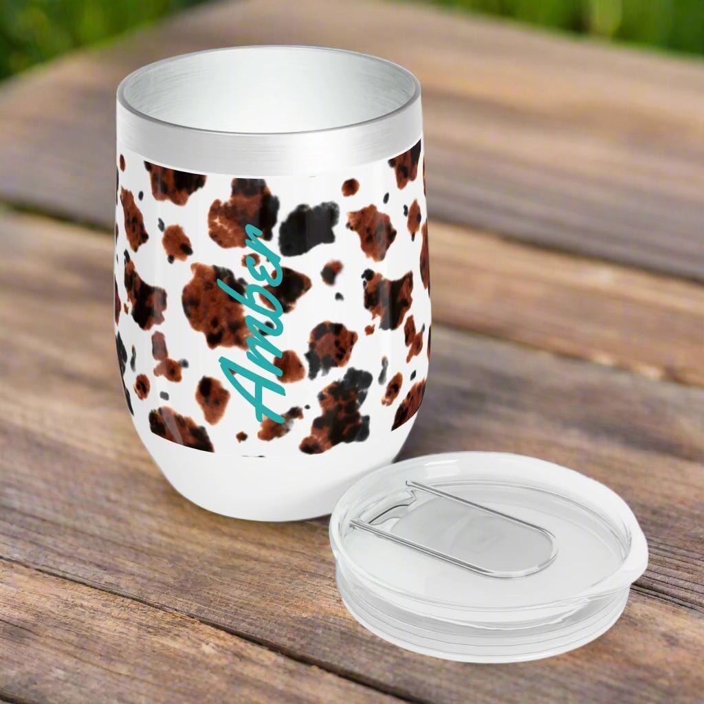 Perfect for sunny picnics, backyard BBQs, front porch lounging, or a quiet evening with your favorite wine—this cup goes wherever you do.

✅ 12oz size, just right for wine, cocktails, or iced coffee
✅ Double-wall vacuum insulated to keep drinks cold up to 12 hours (and hot for 6!)
✅ Durable stainless steel construction with a horizontal stipple texture
✅ Personalized full-wrap design—make it yours!
✅ BPA-free clear lid with slide closure for easy, no-spill sipping