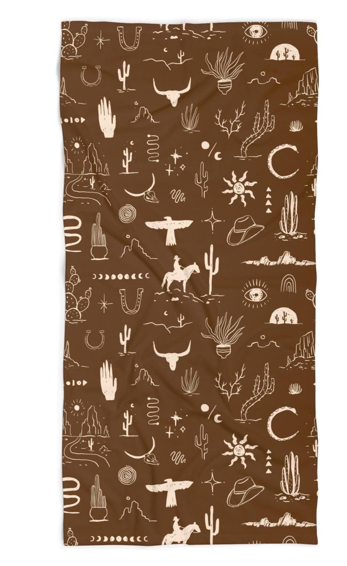 Available in 8 bold background colors, this towel is the perfect way to show off your Western spirit, from rodeo mornings to lazy river afternoons.

✓ Vibrant Allover Western Design – Cowboys, cacti, thunderbirds, and more
✓ Choose Your Style – Available in 8 stunning background colors
✓ Oversized & Comfortable – 30&quot; x 60&quot; towel wraps up adults with ease
✓ Soft & Absorbent – Plush cotton loop backing with a smooth, vivid poly front
✓ Built Tough – Hemmed edges for durability wash after