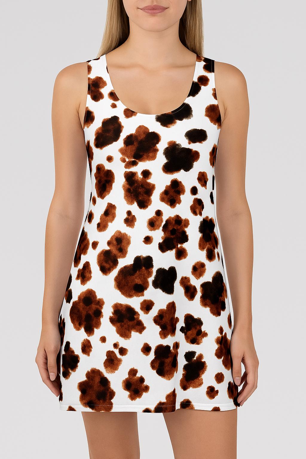 Brindle Cowprint Racerback Dress. FREE SHIPPING ALL ORDERS $35+ The brindle brown pattern gives it a rich, earthy twist on the classic cowprint look 🤎 Whether you’re two-steppin’ at a concert or lounging by the lake, this racerback cut keeps things cute and cool.

✅ Lightweight 100% polyester that flows with every step
✅ Sporty, flattering fit with soft seams and no itchy tag
✅ Tagless & breathable = all-day chill
✅ True to size with a breezy, comfy cut