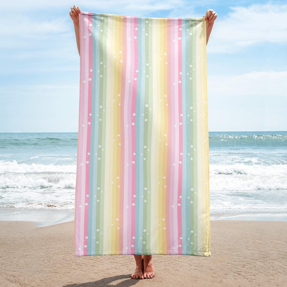 🌈 Pastel Rainbow & Stars Beach Towel – Soft, Colorful, and Made to Match! ⭐🩱
Wrap her up in magic after a swim! This pastel rainbow towel with white stars is the perfect match to our girls&#39; swimsuit—bringing cozy vibes and vibrant style to every pool day, beach trip, or bath time.

✓ Super soft cotton-poly blend
✓ Printed on one side with bright, lasting color
✓ Terry fabric underside = extra absorbent
✓ Lightweight, packable, and quick-drying
✓ Generous size: 30&quot; × 60&quot; for full