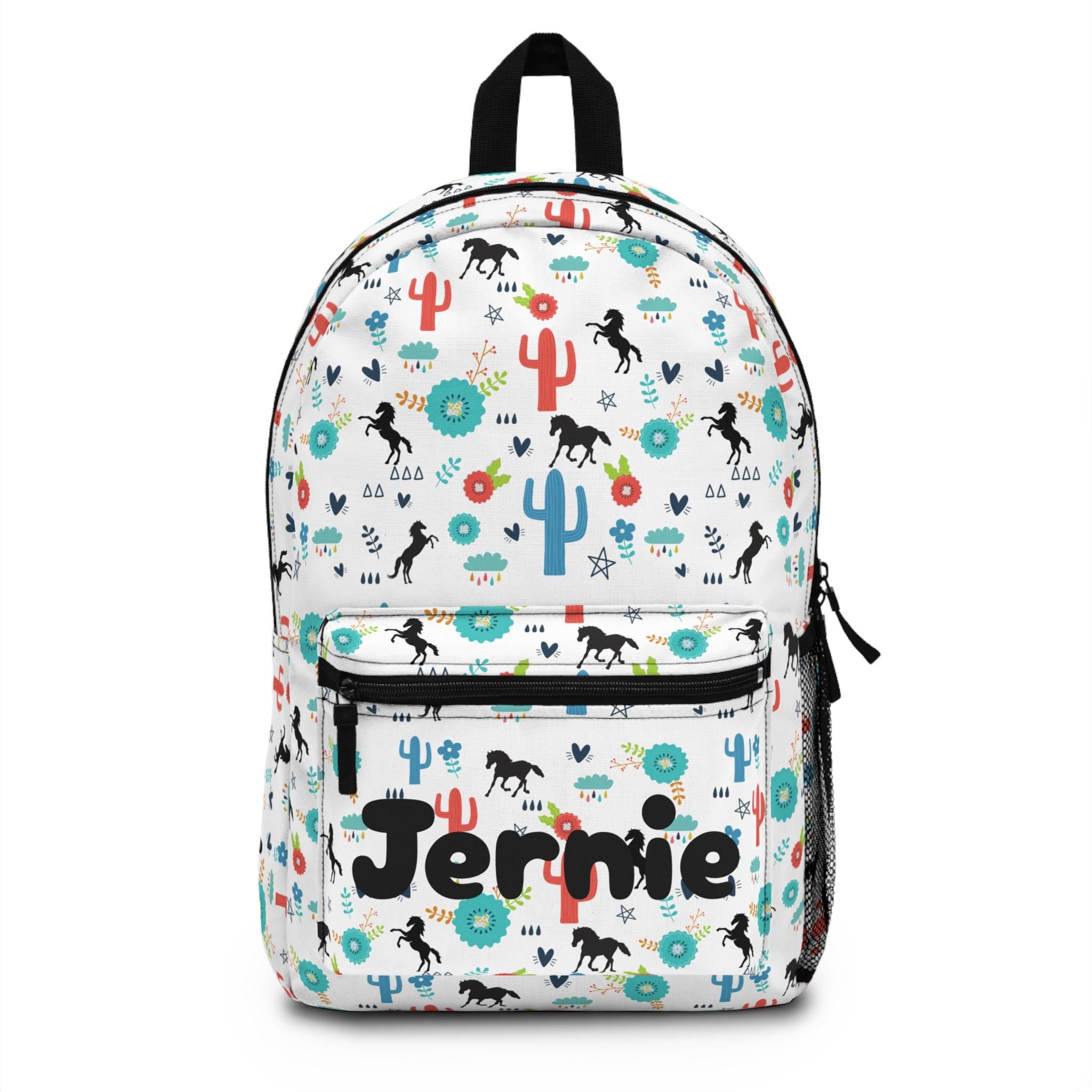 Personalized Horse Backpack for Kids – Fun Western Print with Black Horses, Cacti & Desert Blooms


✓ Custom name option – uniquely hers or left blank
✓ Made from durable 100% polyester – tough enough for daily use
✓ Comfy padded back & shoulder straps – all-day wear approved
✓ Multiple compartments – room for books, snacks, and toy ponies
✓ Secure zipper closures – to keep all her treasures safe
✓ Adjustable straps – grows with her for the perfect fit